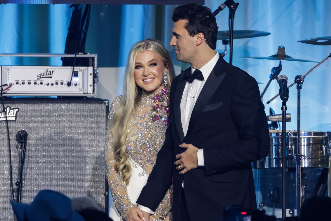 Charlie Kirk and his wife Erika Kirk on stage during the Turning Point USA Inaugural-Eve Ball at the Salamander Hotel on January 19, 2025.