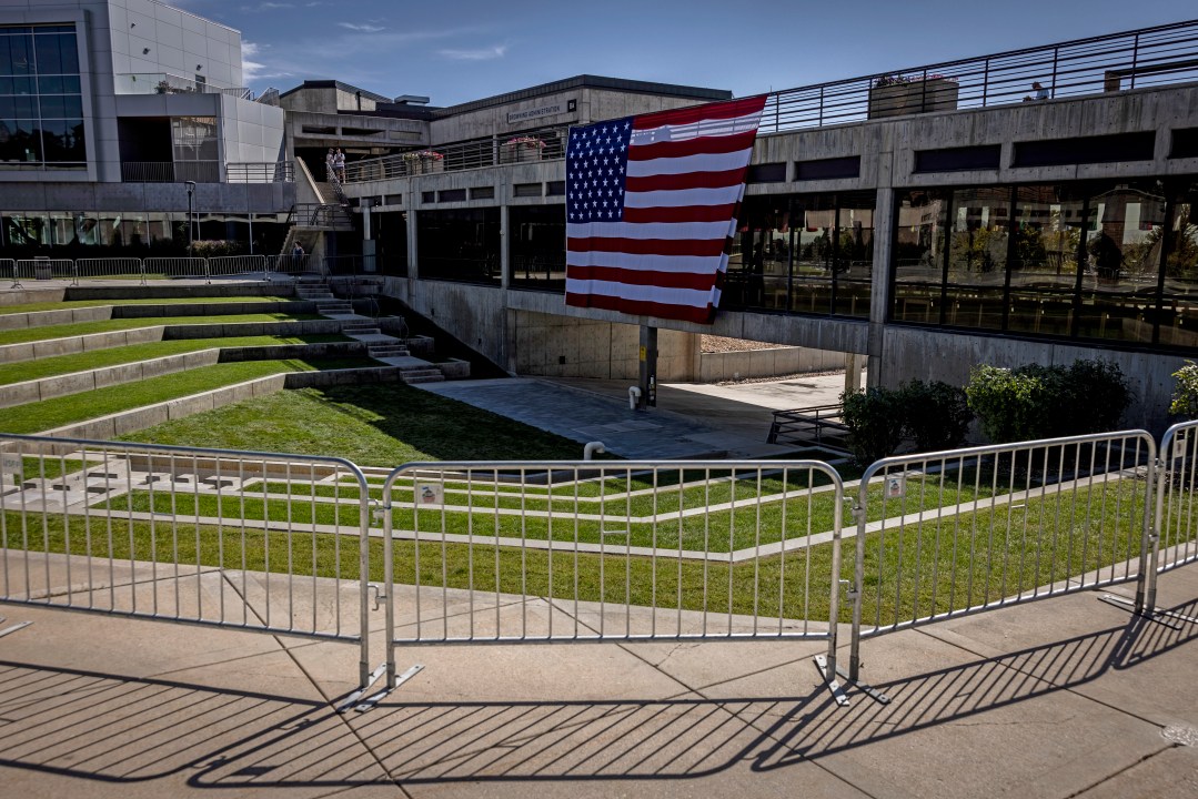 An American flag is hung in the courtyard where Charlie Kirk was shot