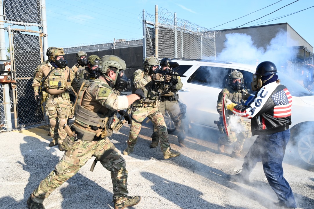 ICE officers clash with protestors at Broadview Illinois ICE facility.