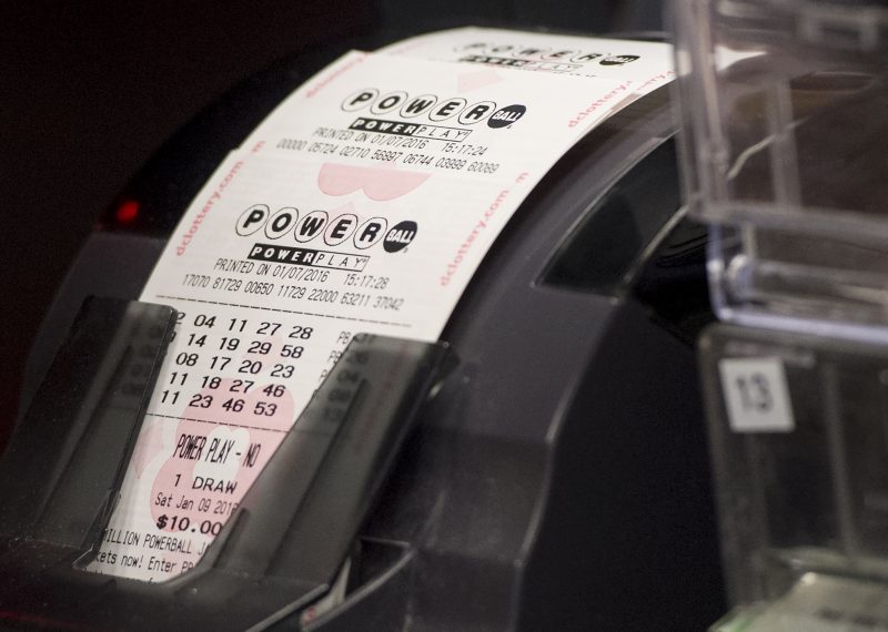 A machine prints Powerball lottery tickets at a convenience store in Washington, D.C.