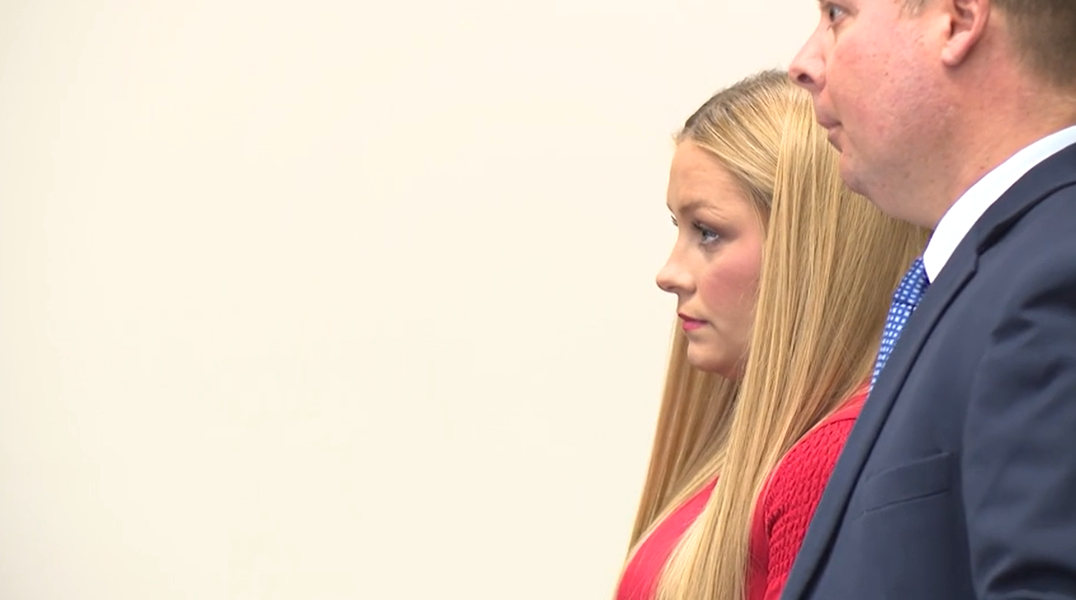 Laken Snelling, a former University of Kentucky cheerleader who was arrested after her infant was found dead in a closet, appears in court. (Credit WDKY)
