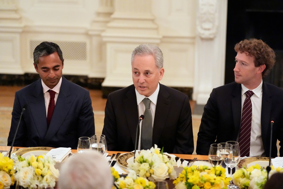 Chamath Palihapitiya, left, White House AI and crypto czar David Sacks and Facebook CEO Mark Zuckerberg listen during a dinner with President Donald Trump in the State Dinning Room of the White House, Thursday, Sept. 4, 2025, in Washington. (AP Photo/Alex Brandon)