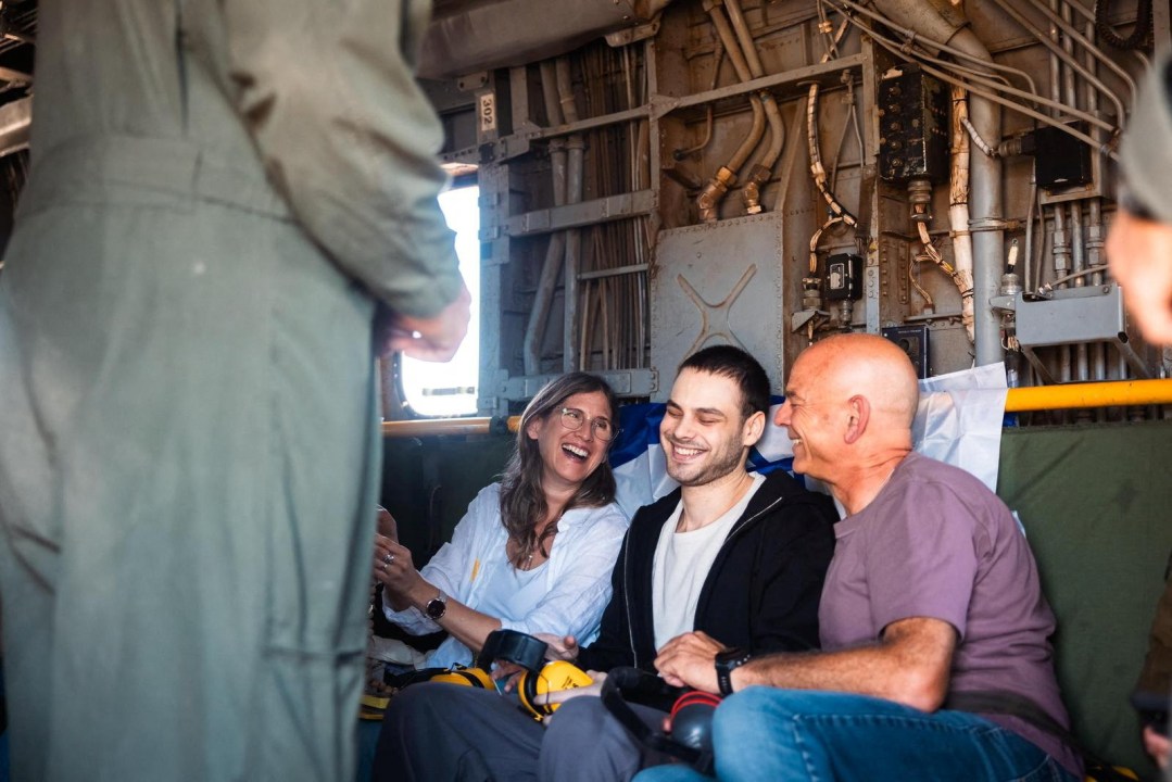 Released hostage and family travel in helicopter