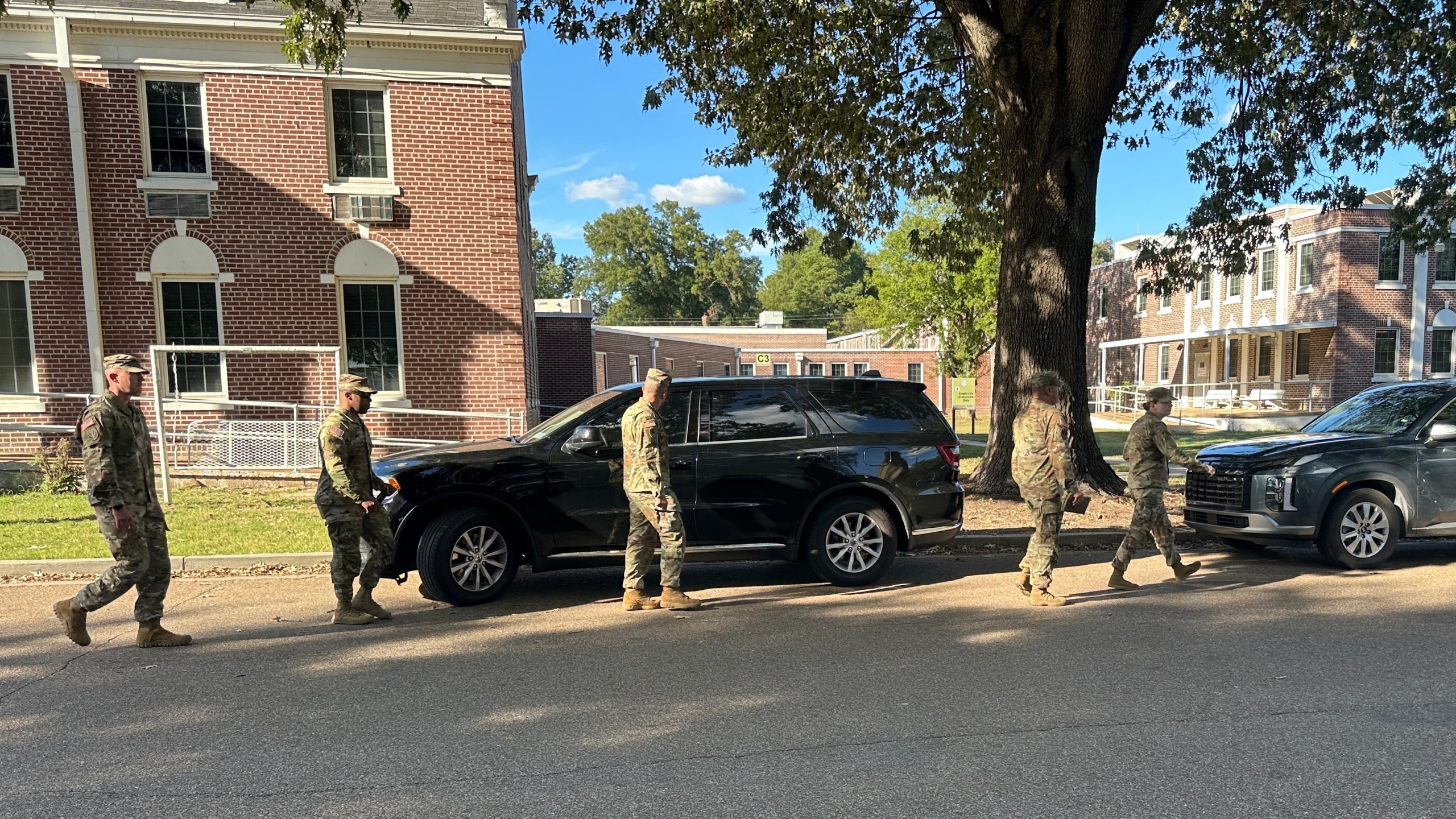National Guard soldiers leave the Shelby County Office of Preparedness in Memphis, Tenn., Wednesday, Oct. 1, 2025. (AP Photo/Adrian Sainz)