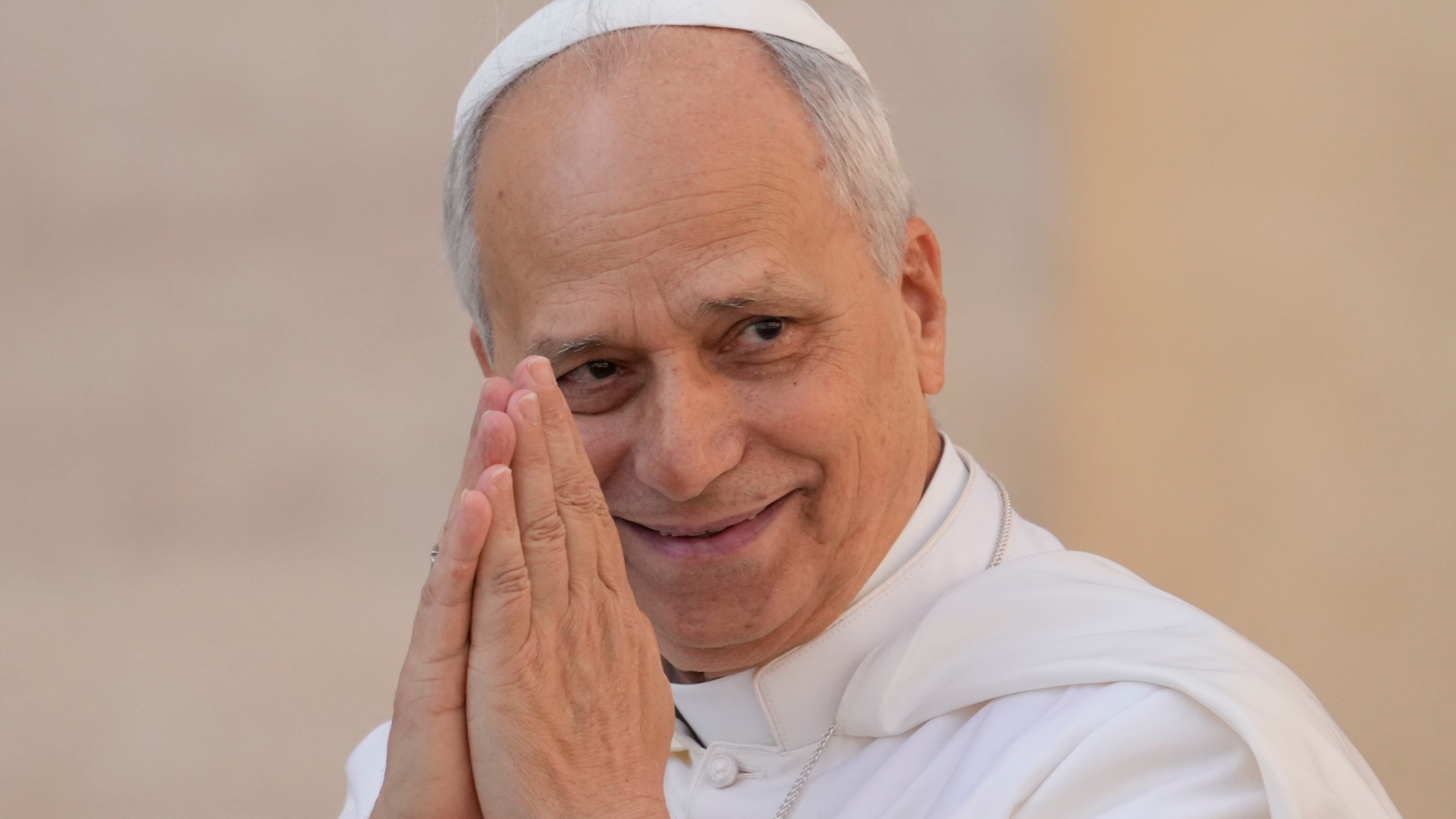 Pope Leo XIV gestures as he arrives for his weekly general audience in St. Peter's Square at The Vatican, Wednesday, Oct.1, 2025. (AP Photo/Gregorio Borgia)