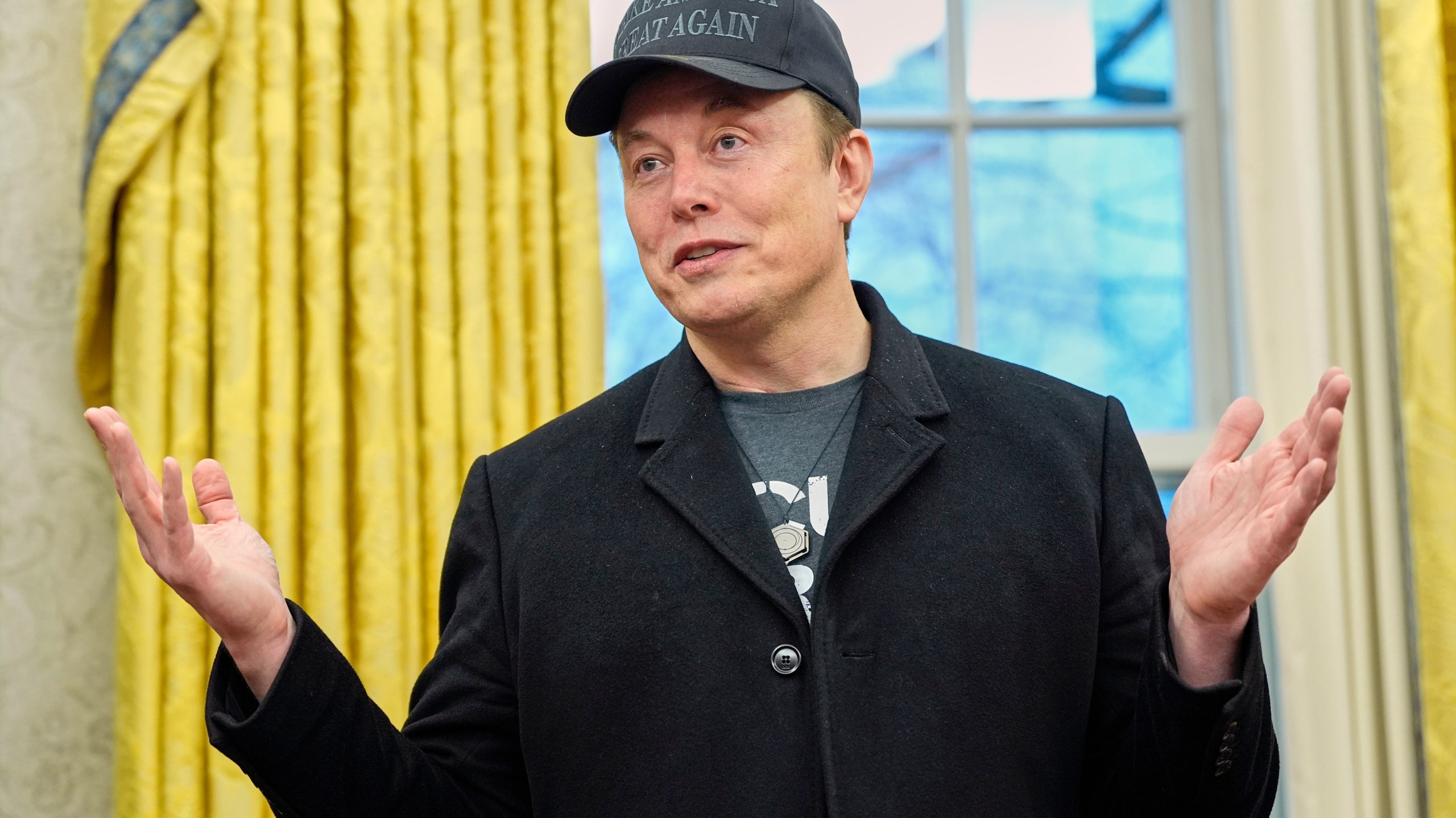 FILE - Elon Musk speaks during an event with President Donald Trump in the Oval Office at the White House, Feb. 11, 2025, in Washington. (AP Photo/Alex Brandon, File)