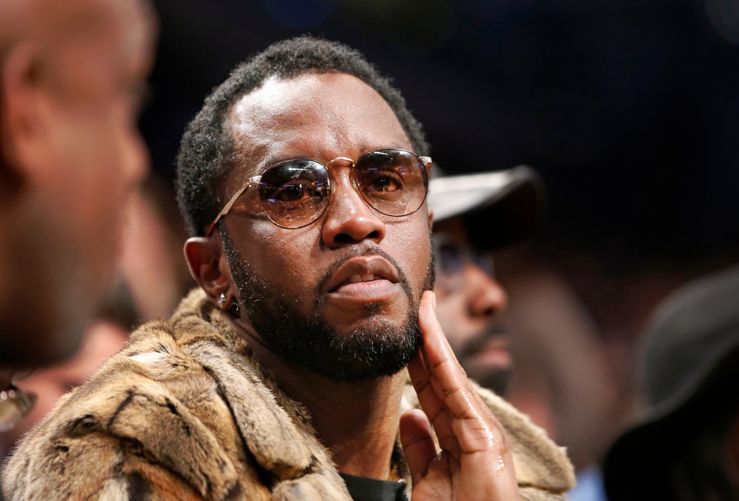Diddy courtside at a basketball game