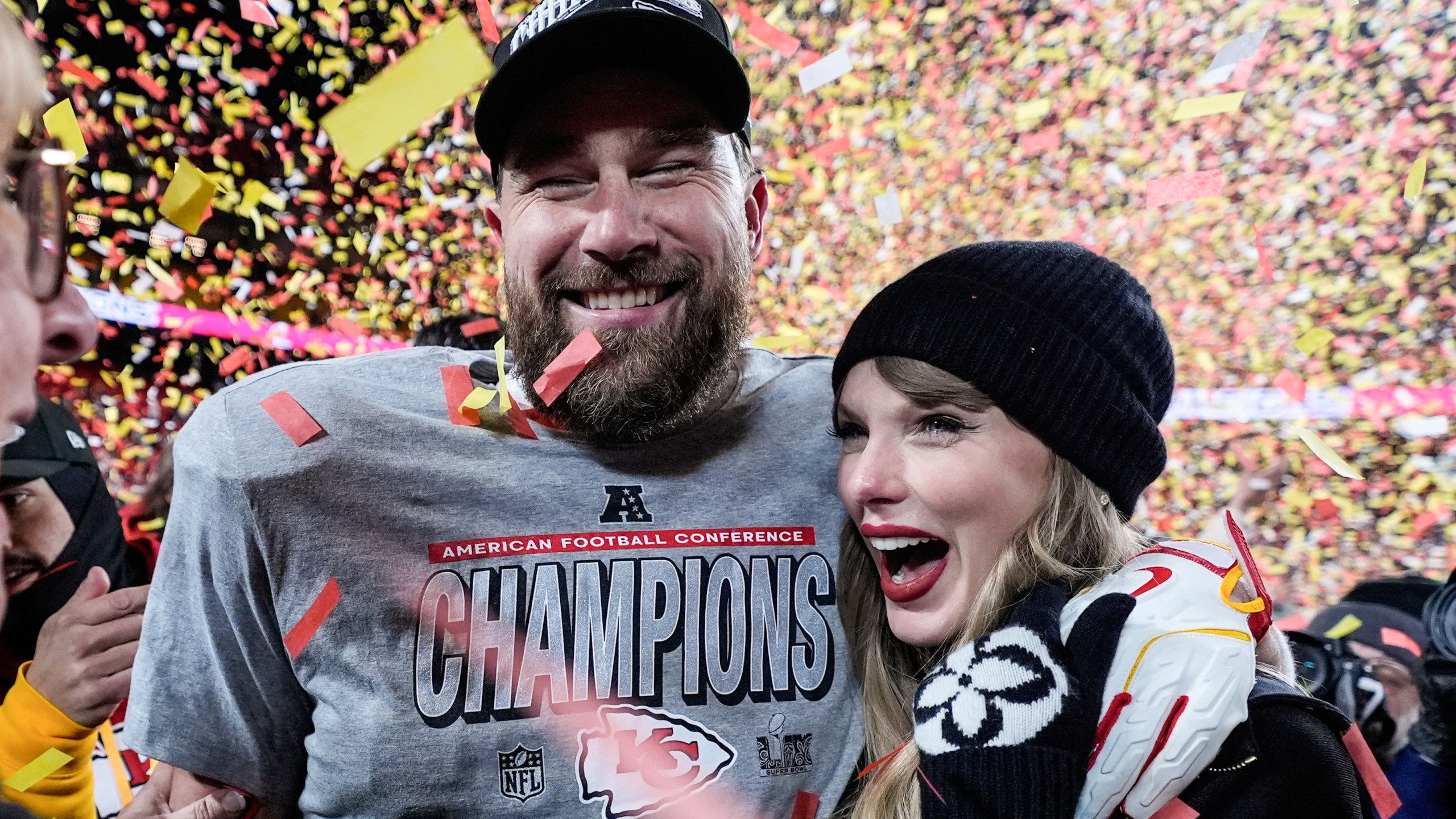 FILE - Travis Kelce, left, and Taylor Swift pose after the AFC Championship NFL football game against the Buffalo Bills, Jan. 26, 2025, in Kansas City, Mo. (AP Photo/Ashley Landis, File)