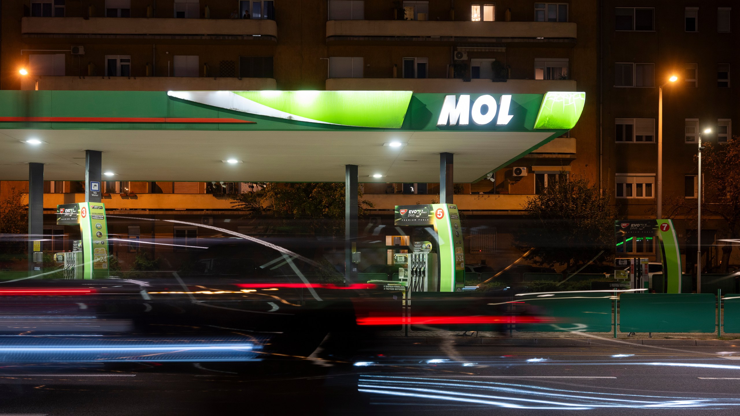 A car drives by a of MOL gas station in downtown Budapest, Hungary, on Sept. 27, 2025. (AP Photo/Denes Erdos)