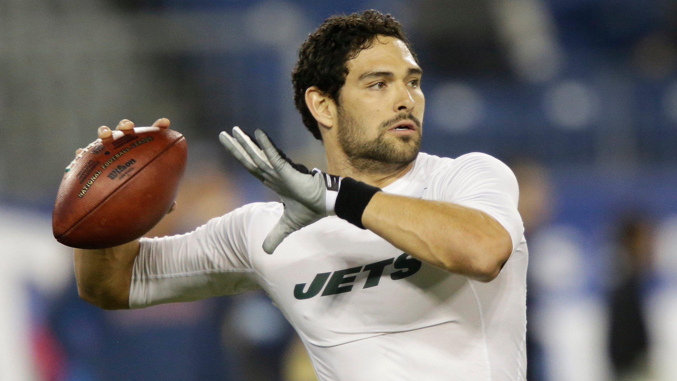 FILE - New York Jets quarterback Mark Sanchez warms up before an NFL football game between the Jets and the Tennessee Titans on Monday, Dec. 17, 2012, in Nashville, Tenn. (AP Photo/Wade Payne, File)