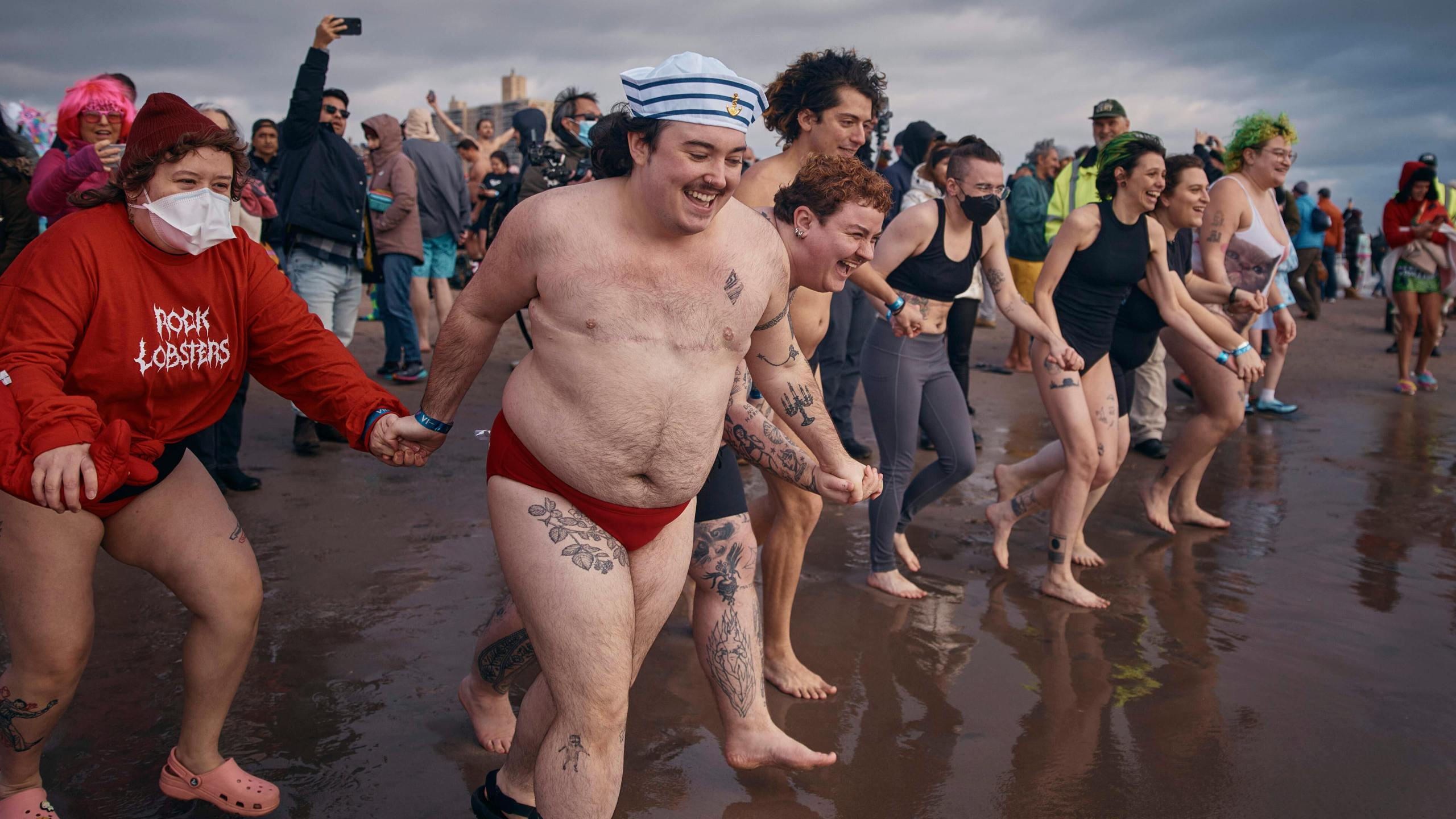 FILE - Revelers enter the cold water during the annual Polar Bear Plunge on New Year's Day, Jan. 1, 2025, in New York. (AP Photo/Andres Kudacki, file)