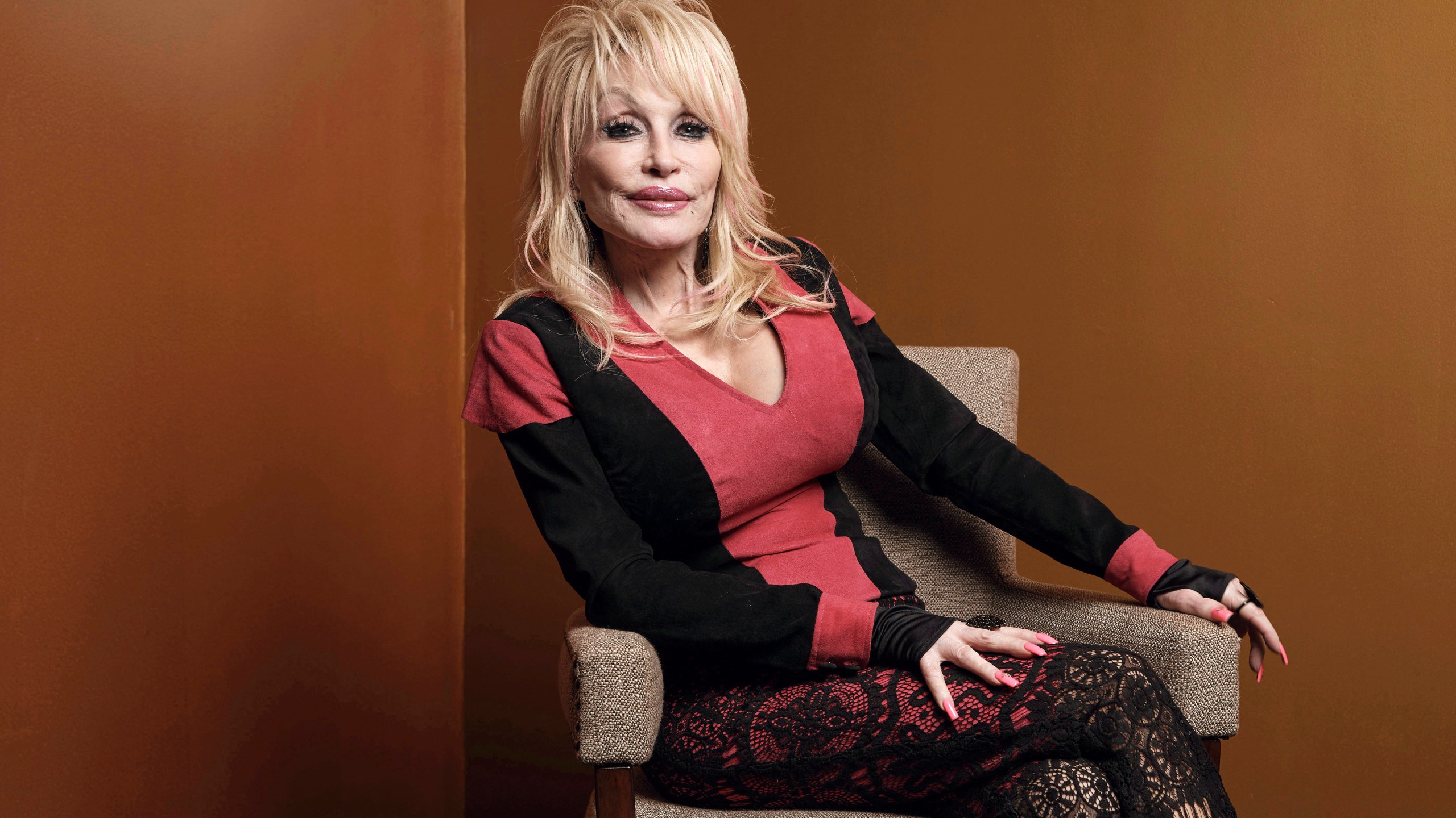 FILE - Dolly Parton poses at the Carnegie Medal of Philanthropy Ceremony in New York, on Oct. 13, 2022. (AP Photo/Andres Kudacki, File)