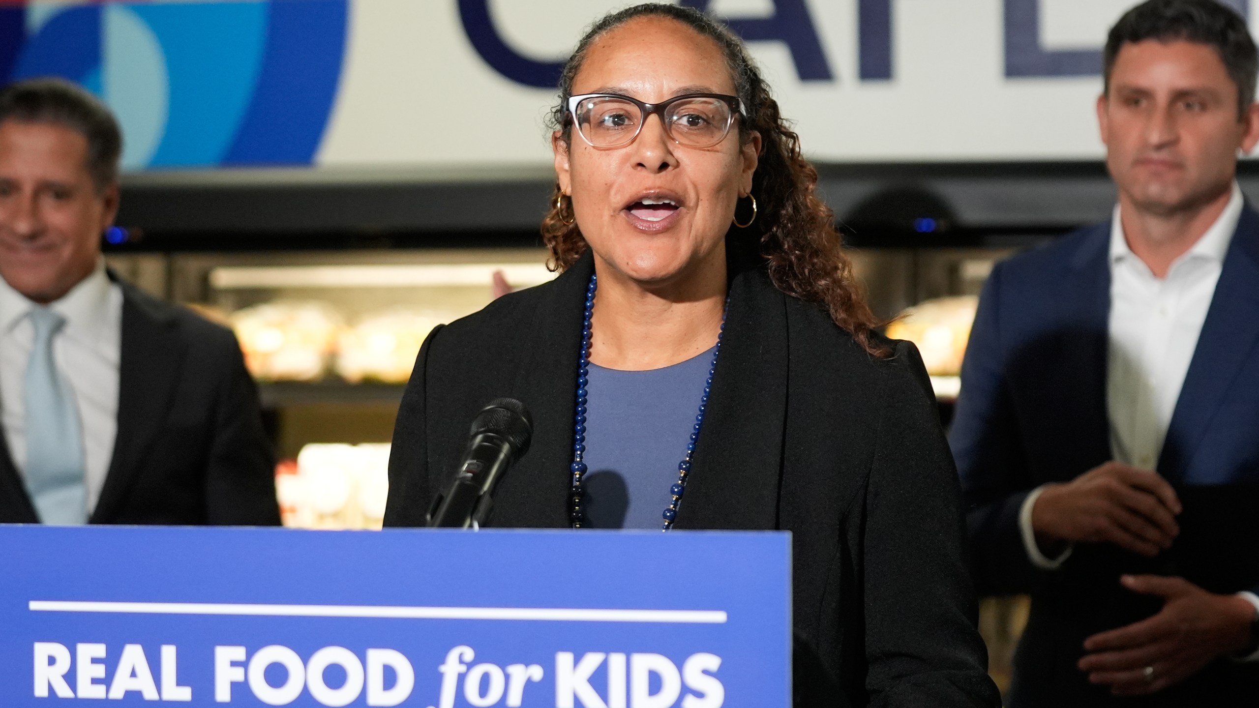 Human Services Agency Secretary Kim Johnson speaks at a news conference at Belvedere Middle School, Wednesday, Oct. 8, 2025, in Los Angeles. (AP Photo/Damian Dovarganes)
