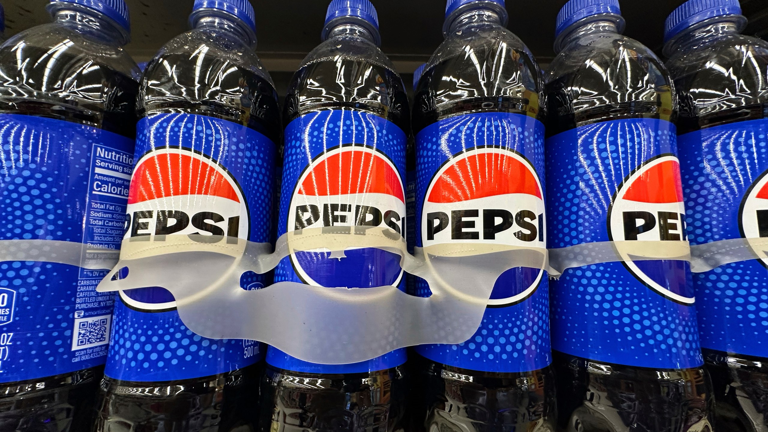 FILE - Bottles of Pepsi are displayed at a grocery store in Mount Prospect, Ill., Thursday, July 17, 2025. (AP Photo/Nam Y. Huh, File)