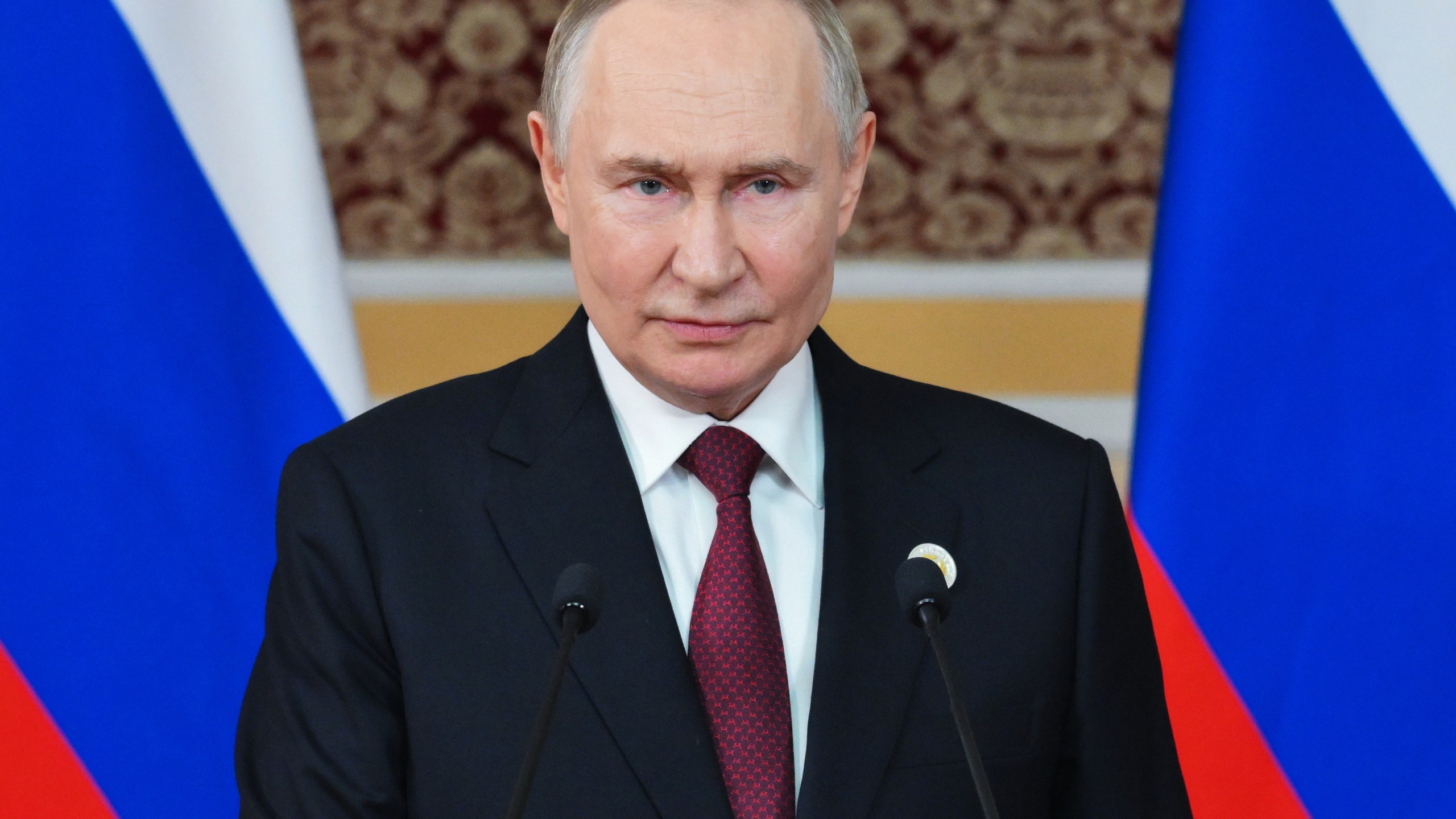 Russian President Vladimir Putin holds a news conference after the summit of the Commonwealth of Independent States in Dushanbe, Tajikistan, Friday, Oct. 10, 2025. (Grigory Sysoyev, Sputnik, Kremlin Pool Photo via AP)