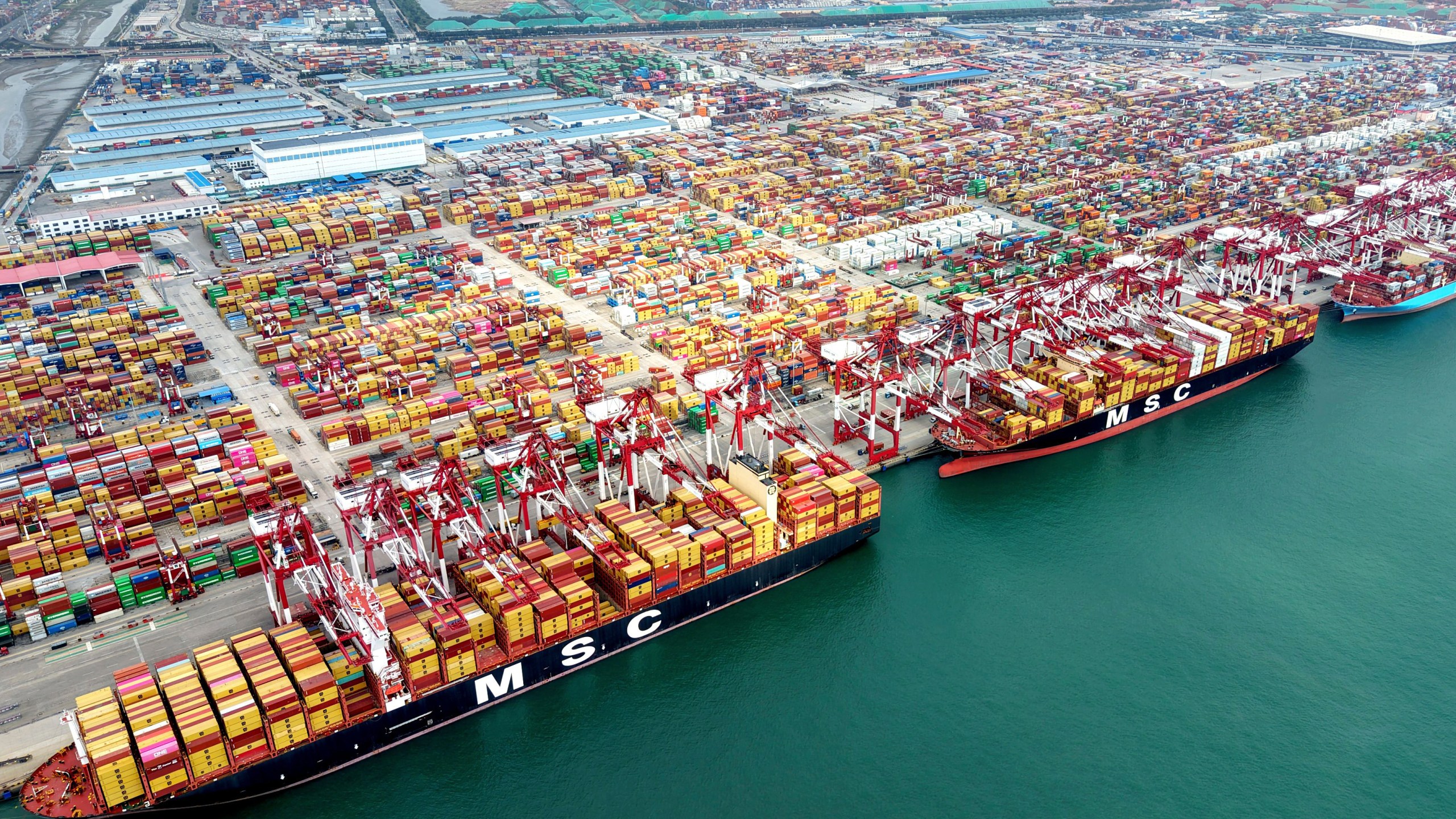 An aerial view of a container terminal in Qingdao in eastern China's Shandong province on Thursday, Oct. 9, 2025. (Chinatopix Via AP)