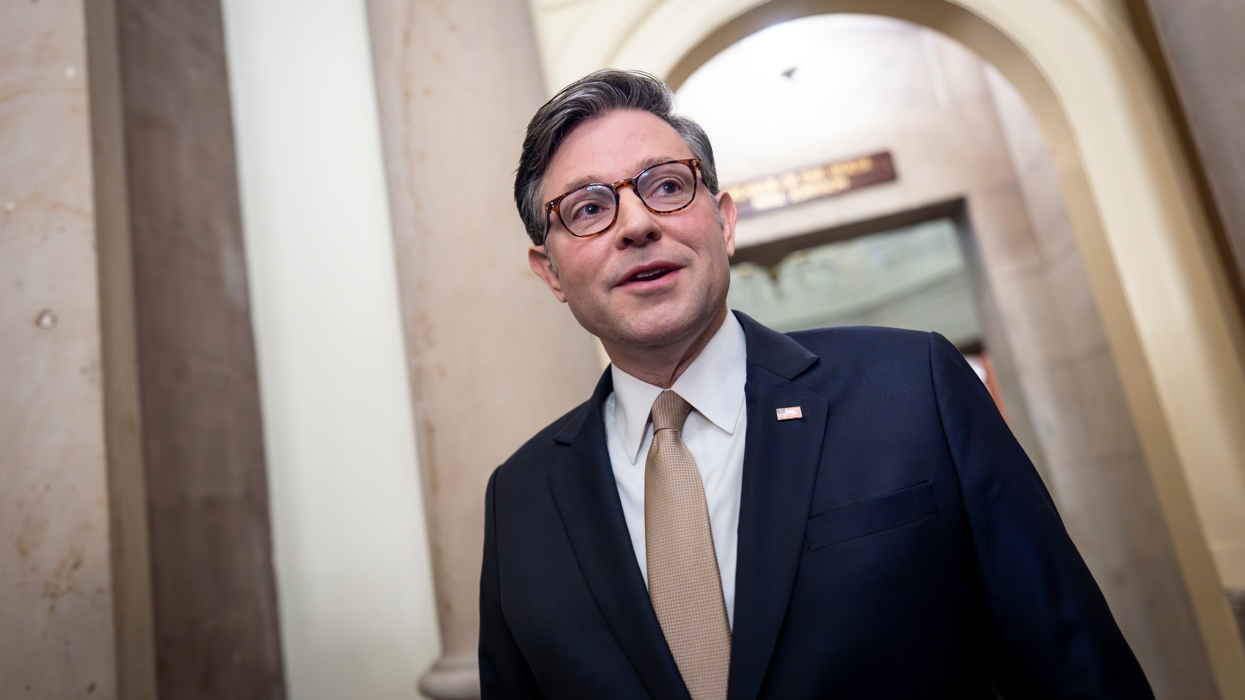 Speaker of the House Mike Johnson, R-La., praises President Donald Trump's peacemaking efforts leading to a ceasefire pausing two years of war in the Gaza Strip, at the Capitol in Washington, Monday, Oct. 13, 2025. (AP Photo/J. Scott Applewhite)