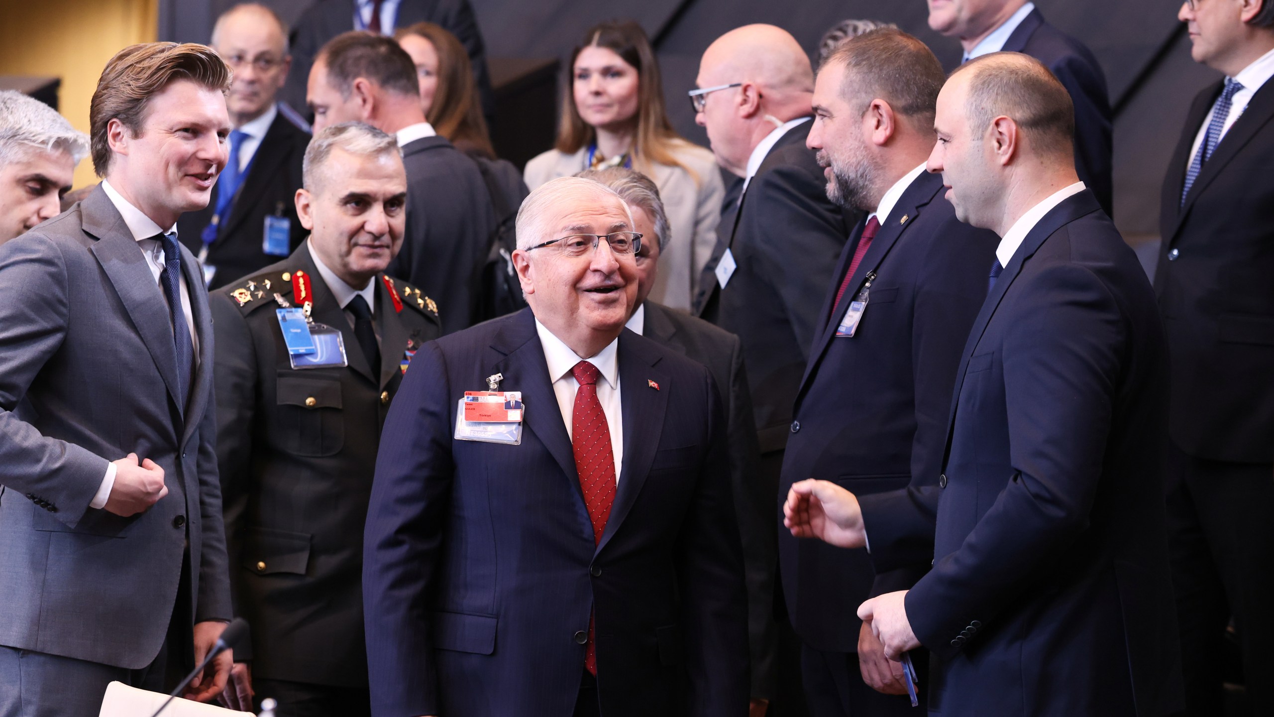 Turkish Defense Minister Yasar Guler, center, and Netherland's Defense Minister Ruben Brekelmans, second left, arrive for a meeting of the North Atlantic Council in defense ministers format at NATO headquarters in Brussels, Wednesday, Oct. 15, 2025 (AP Photo/Omar Havana)