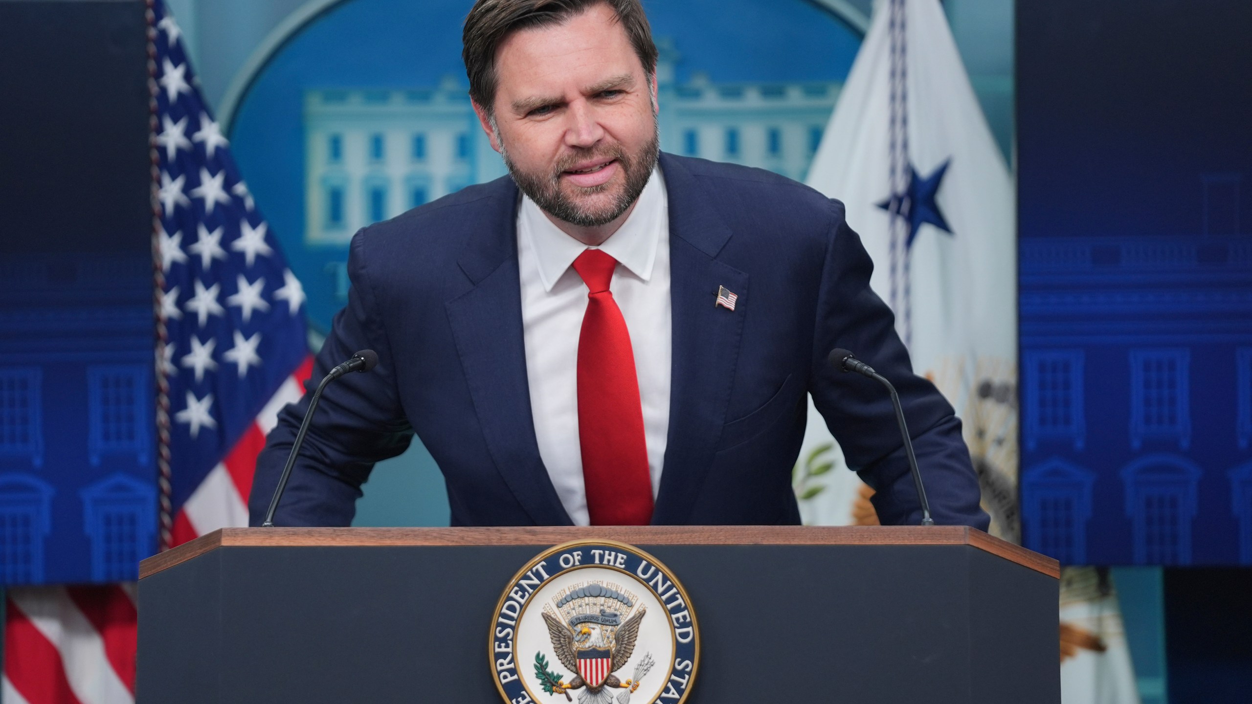 Vice President JD Vance speaking with reporters in the James Brady Press Briefing Room at the White House, Wednesday, Oct. 1, 2025, in Washington. (AP Photo/Evan Vucci)