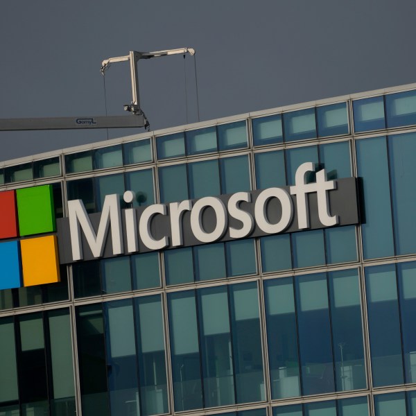 FILE - The logo of Microsoft is seen outside its French headquarters in Issy-les-Moulineaux, outside Paris on May 13, 2024. (AP Photo/Thibault Camus, File)
