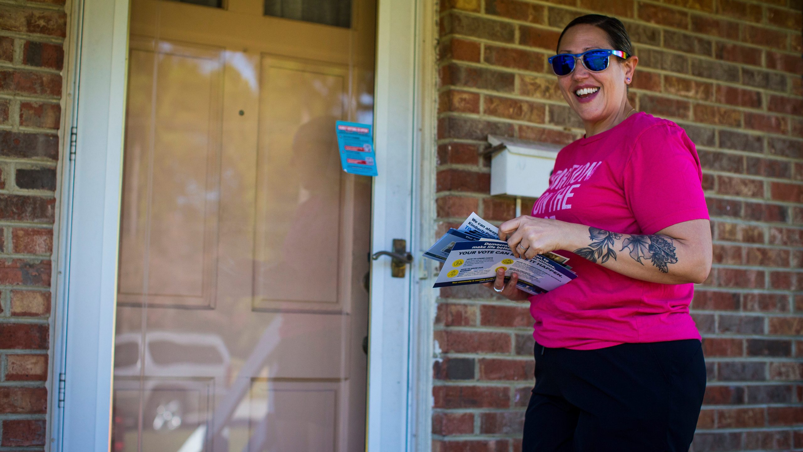 Rae Pickett, who is Communication Director for Planned Parenthood Advocates of Virginia, campaigns for Abigail Spanberger in the governor's race, Oct. 19, 2025 in Petersburg, Va. (AP Photo/John Clark)