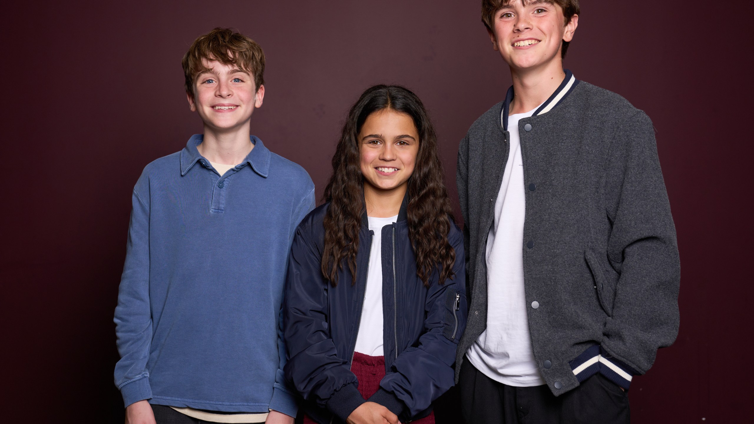 Max Lester, from left, Arabella Stanton and Frankie Treadaway pose for a portrait to promote the Audible "Harry Potter" series in London on July 20, 2025. (Photo by Scott A Garfitt/Invision/AP)