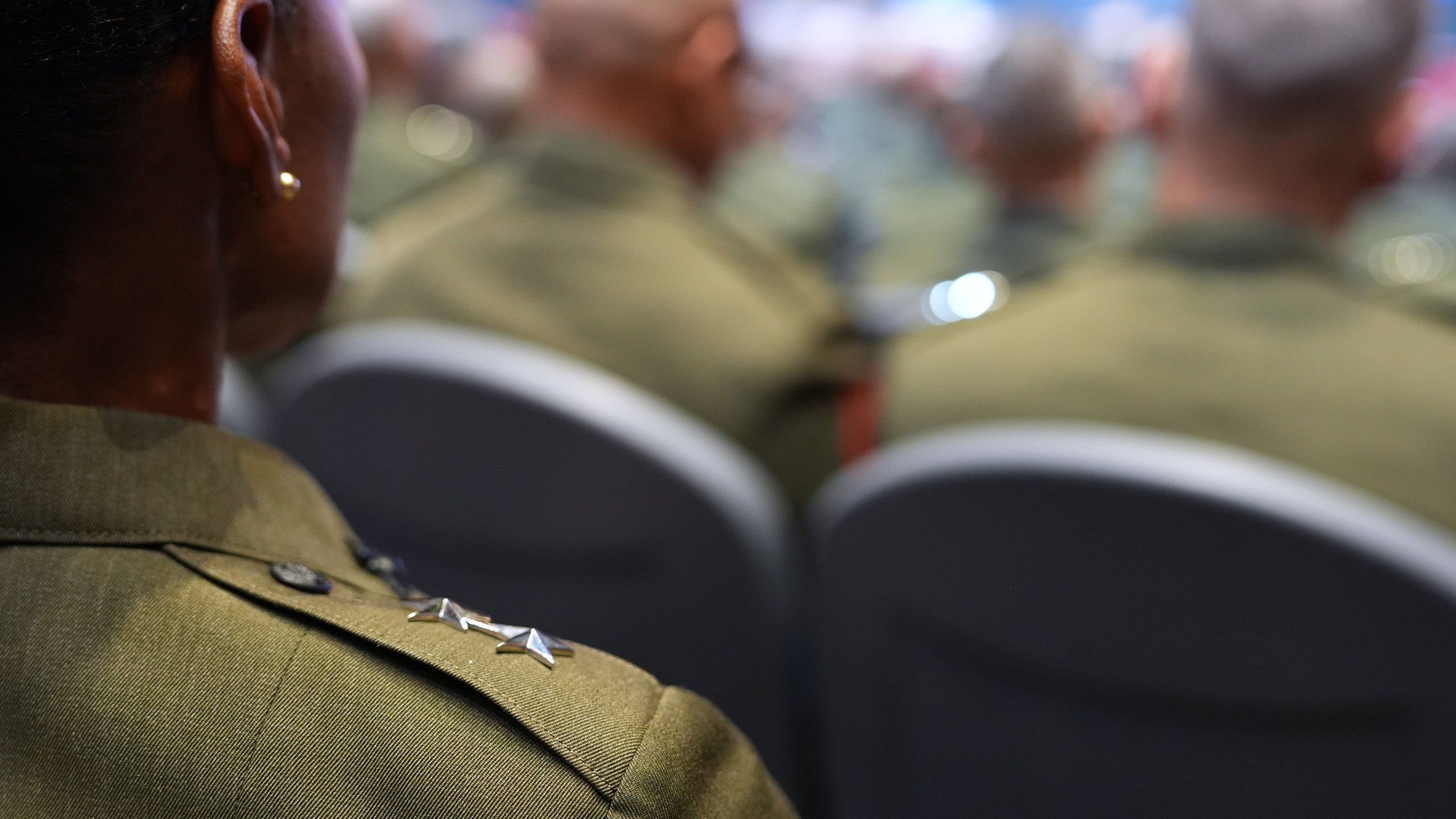U.S. military senior leadership listen as President Donald Trump speaks at Marine Corps Base Quantico, Tuesday, Sept. 30, 2025 in Quantico, Va. (AP Photo/Evan Vucci)