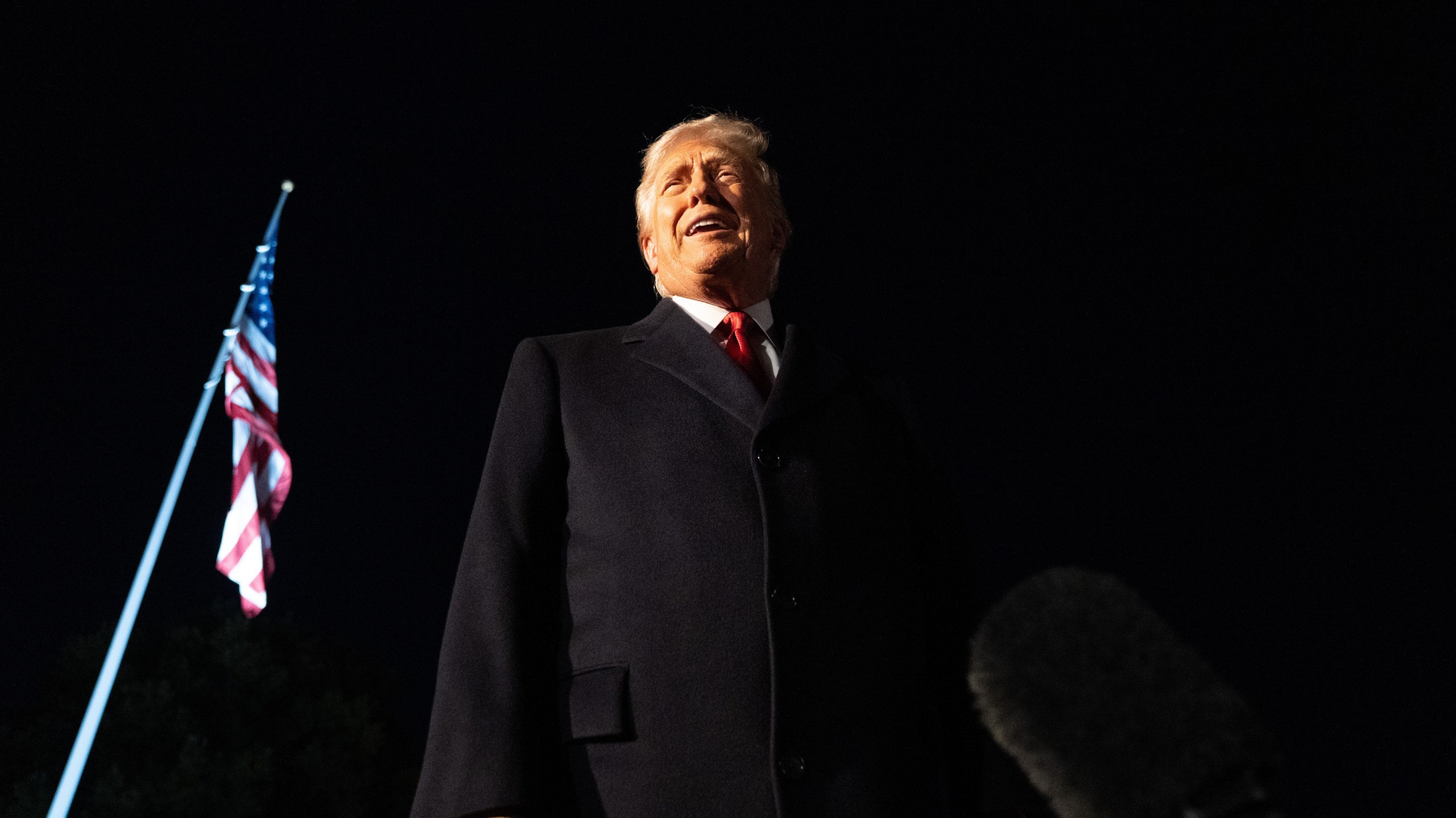 President Donald Trump talks to reporters as he departs the White House, Friday, Oct. 24, 2025, in Washington, for a trip to Asia. (AP Photo/Allison Robbert)