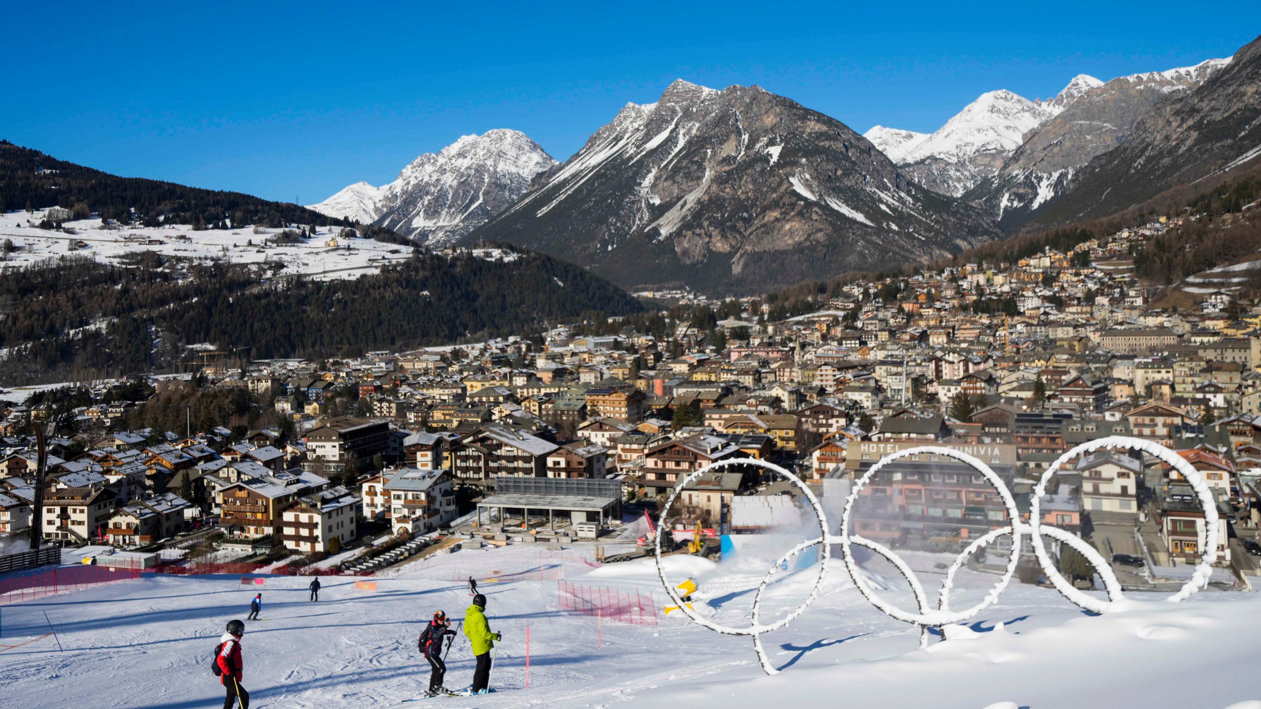 FILE - Olympic rings are seen near a slope of the Stelvio Ski Center, venue for the alpine ski and ski mountaineering disciplines at the Milan Cortina 2026 Winter Olympics, in Bormio, Italy, Thursday, Jan. 16, 2025. (AP Photo/Luca Bruno, File)