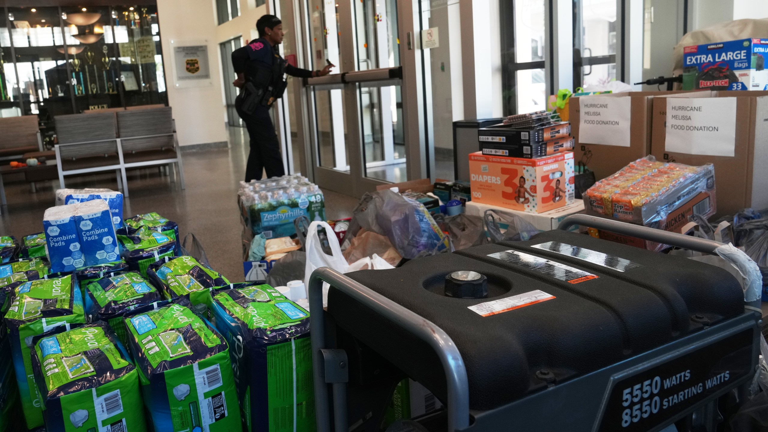 Donated emergency supplies for Jamaica sit in the lobby at the Miramar Police Department Thursday, Oct. 30, 2025, in Miramar, Fla. (AP Photo/Marta Lavandier)