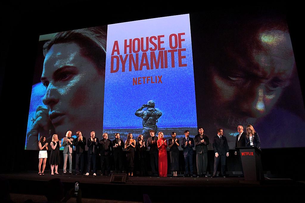 A House of Dynamite cast stands onstage
