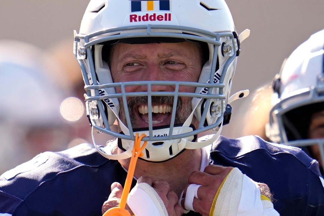 After seeing his first college football game action Lycoming College nose tackle Tom Cillo stands on the sidelines during the second half of an NCAA Division III college football game against King' College in Williamsport, Pa., Sunday, Sept. 28, 2025.