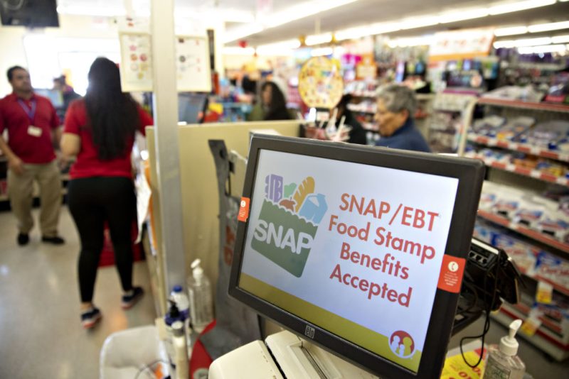 "SNAP/EBT Food Stamp Benefits Accepted" is displayed on a screen