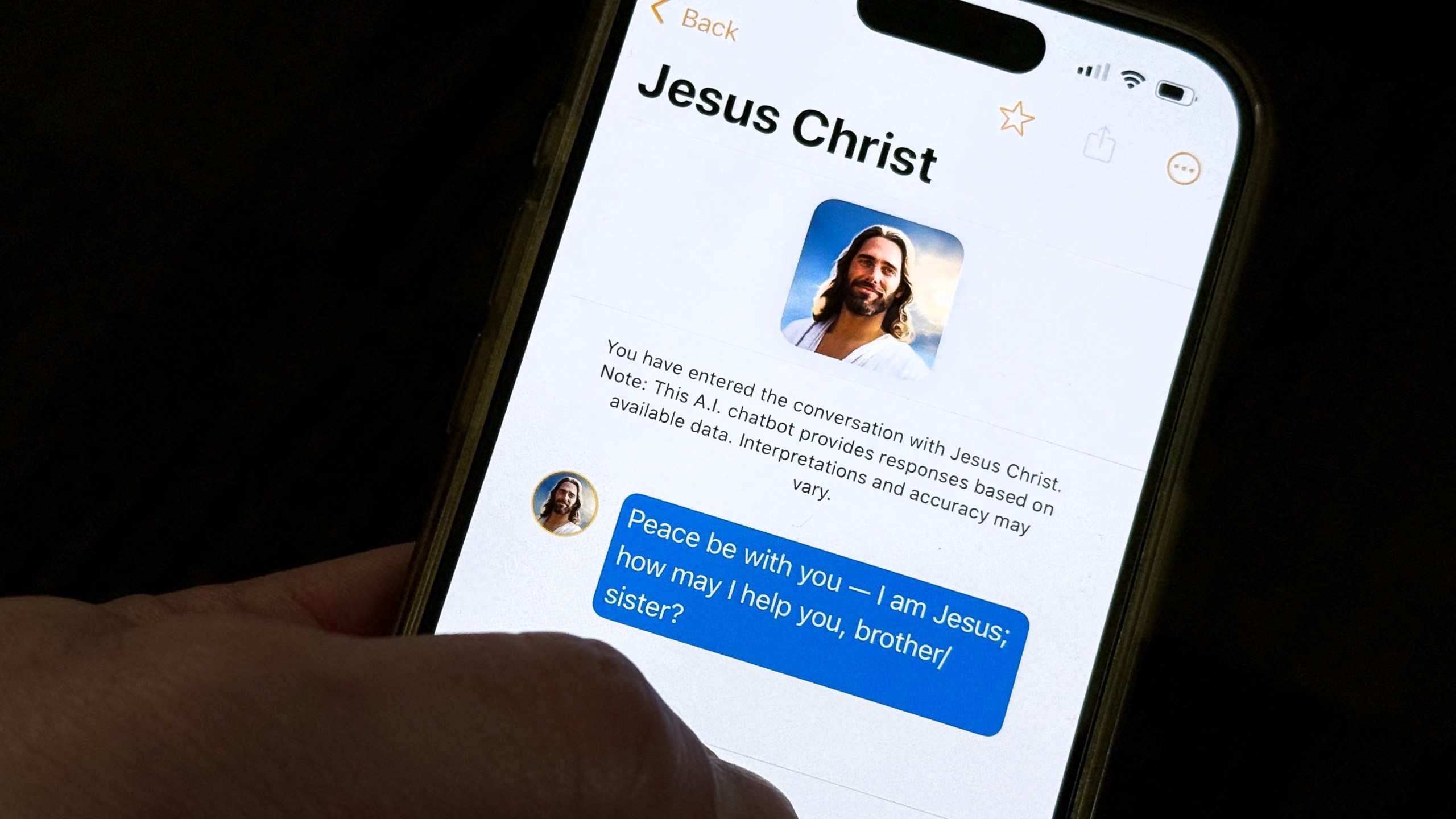 "Text With Jesus" chatbot app displayed on an iPhone