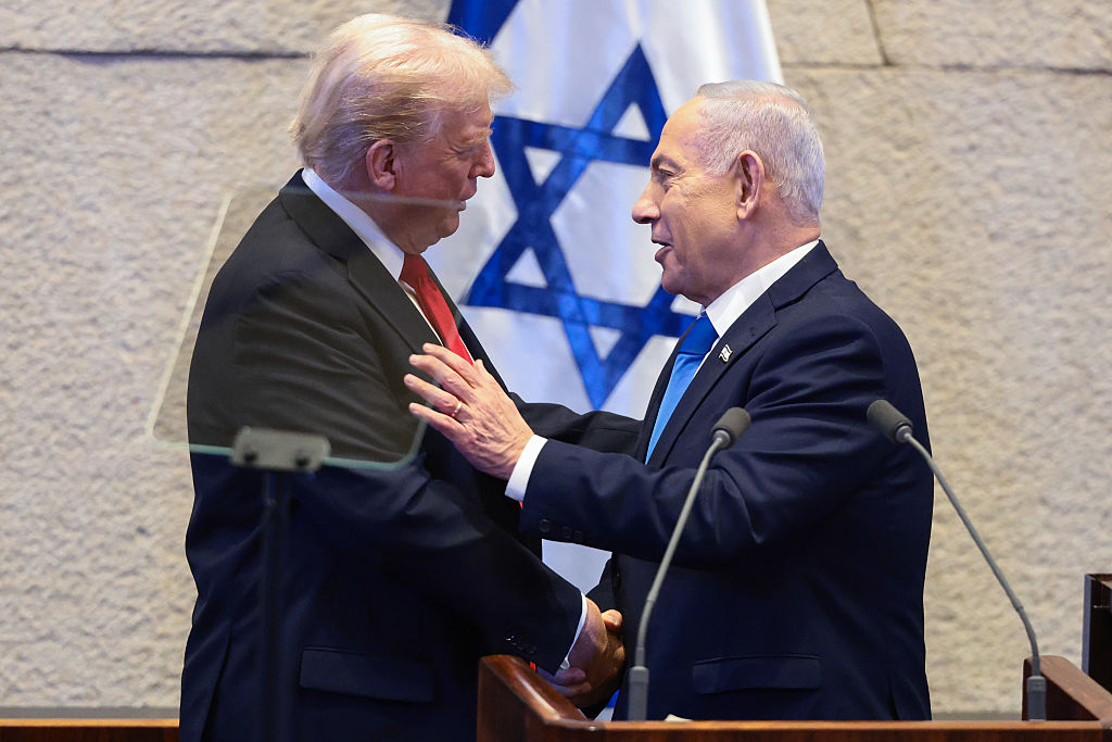 President Donald Trump and Israeli Prime Minister Benjamin Netanyahu shake hands
