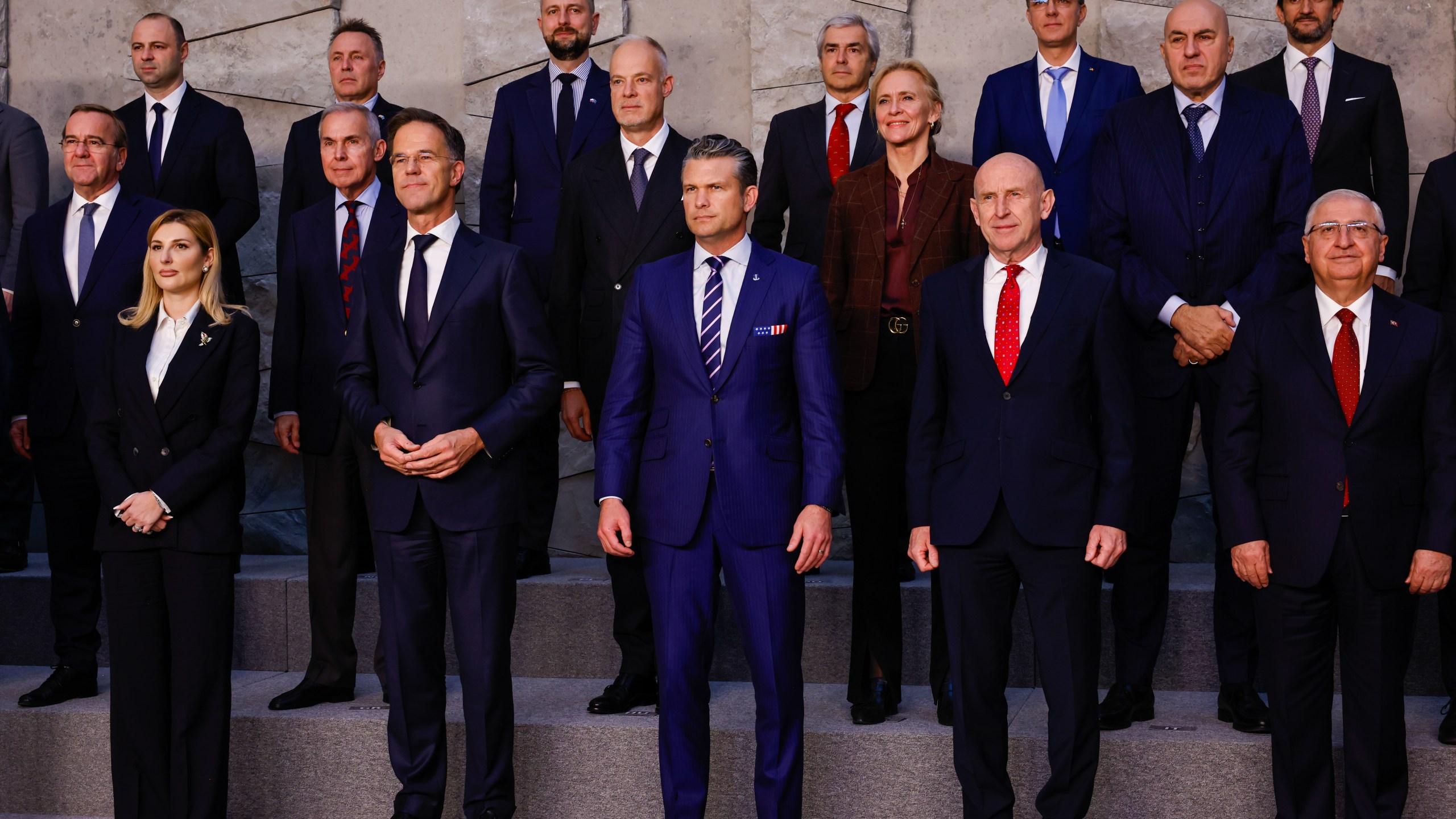 Attendees during a family photo at a meeting of North Atlantic Treaty Organization defense ministers at the NATO headquarters in Brussels, Belgium, on Wednesday, Oct. 15, 2025.