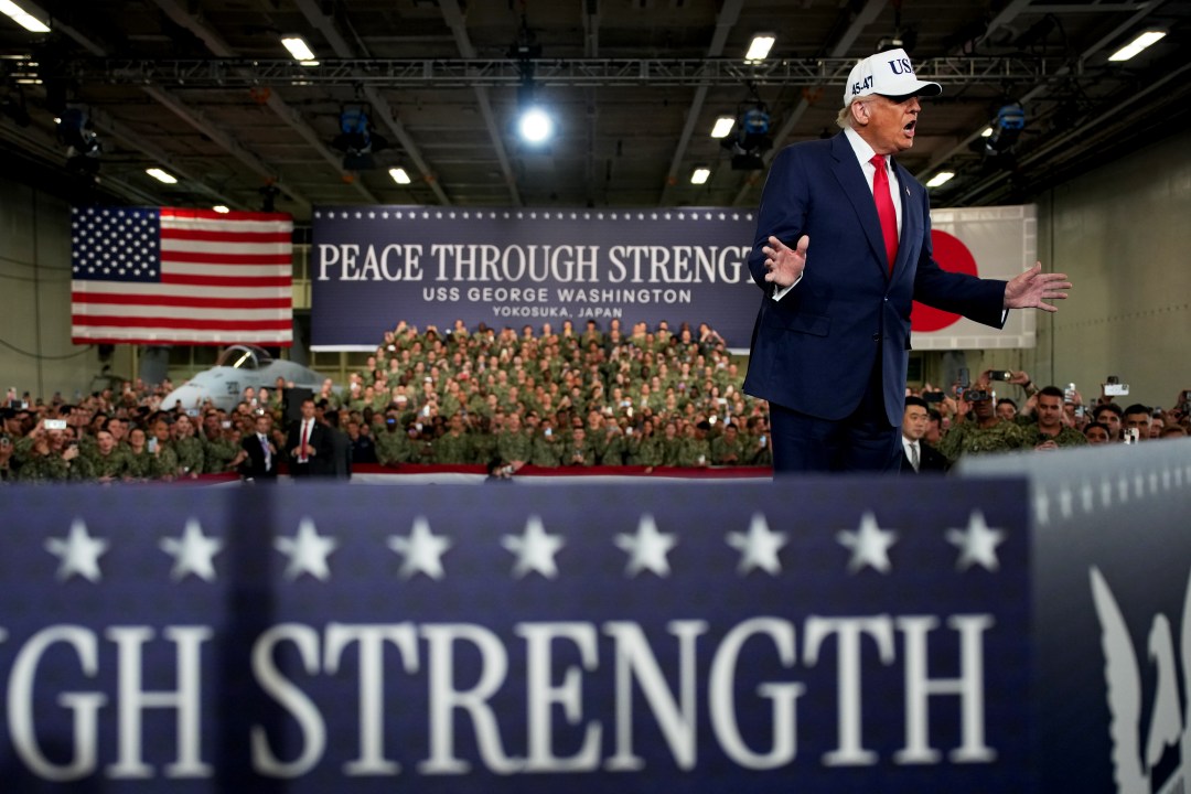 U.S. President Donald Trump speaks to troops aboard USS George Washington