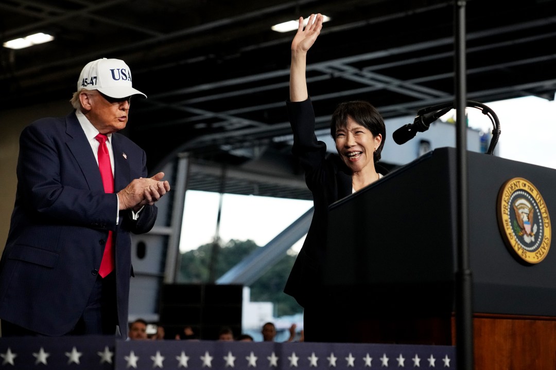 U.S. President Donald Trump applauds as Japanese Prime Minister Sanae Takaichi