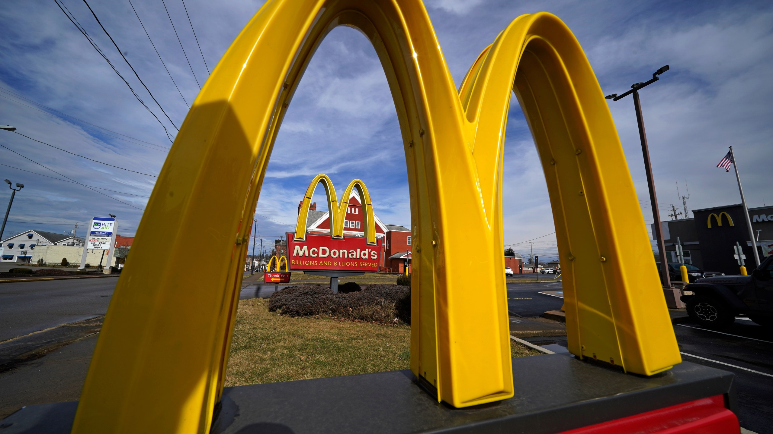 FILE - McDonald's restaurant signs are shown in in East Palestine, Ohio, Feb. 9, 2023. (AP Photo/Gene J. Puskar, File)
