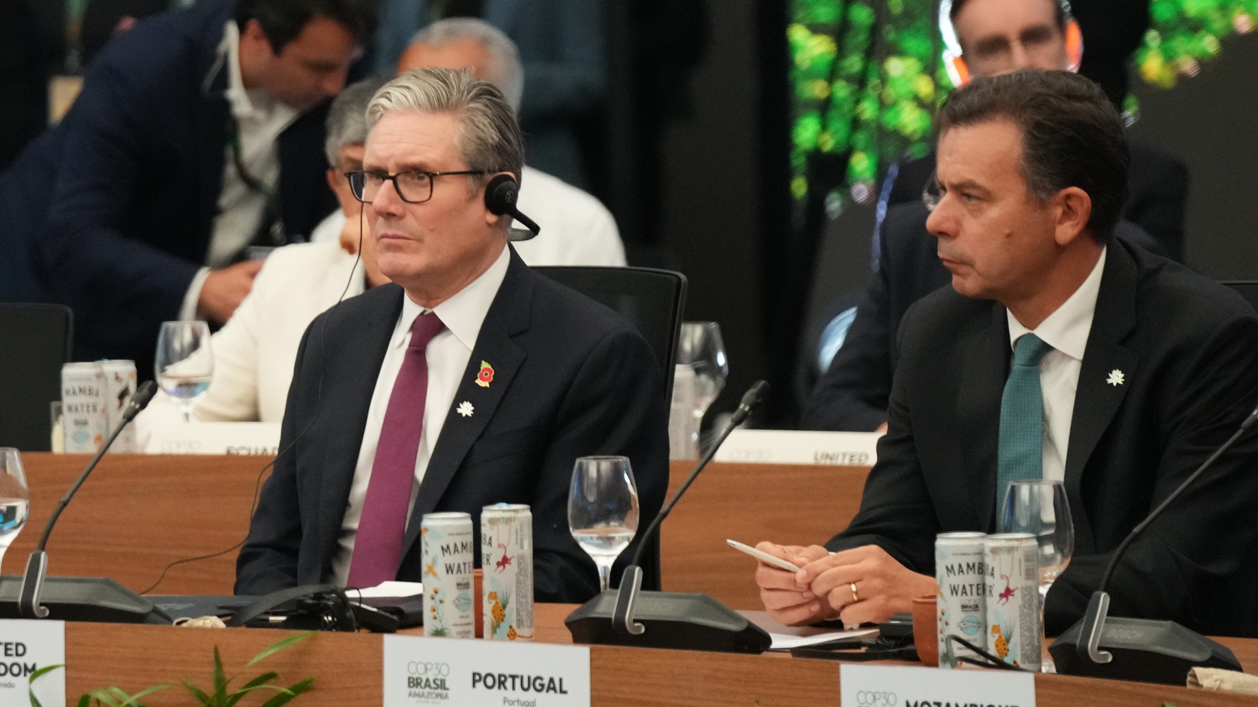 Britain Prime Minister Keir Starmer, left, and Portugal Prime Minister Luis Montenegro attend a roundtable with leaders of tropical forest countries and nations committed to investing in the Tropical Forest Forever Facility (TFFF) during the COP30 U.N. Climate Summit in Belem, Brazil, Thursday, Nov. 6, 2025. (AP Photo/Fernando Llano)