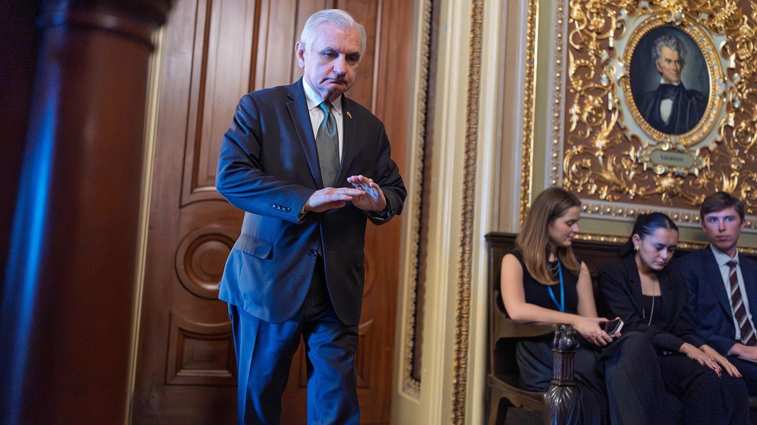 Sen. Jack Reed, D-R.I., leaves a meeting room where he and other Senate Democrats at the Capitol are looking for a solution to the spending impasse, in Washington, Thursday, Nov. 6, 2025, day 37 of the government shutdown. (AP Photo/J. Scott Applewhite)
