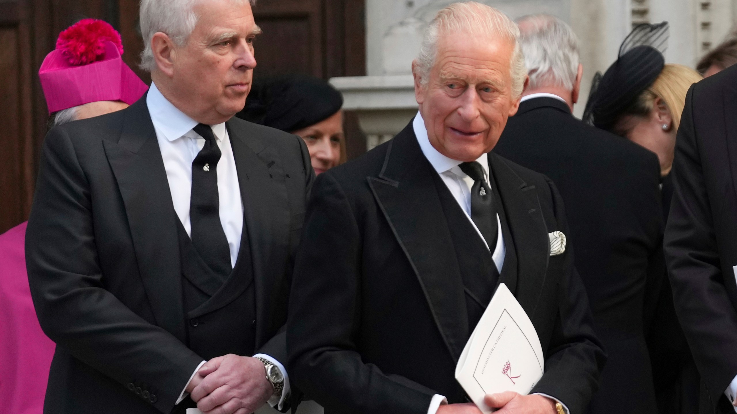 FILE - Britain's Prince Andrew, left, and Britain's King Charles III leave after the Requiem Mass service for the Duchess of Kent at Westminster Cathedral in London, Tuesday, Sept. 16, 2025. (AP Photo/Joanna Chan, File)