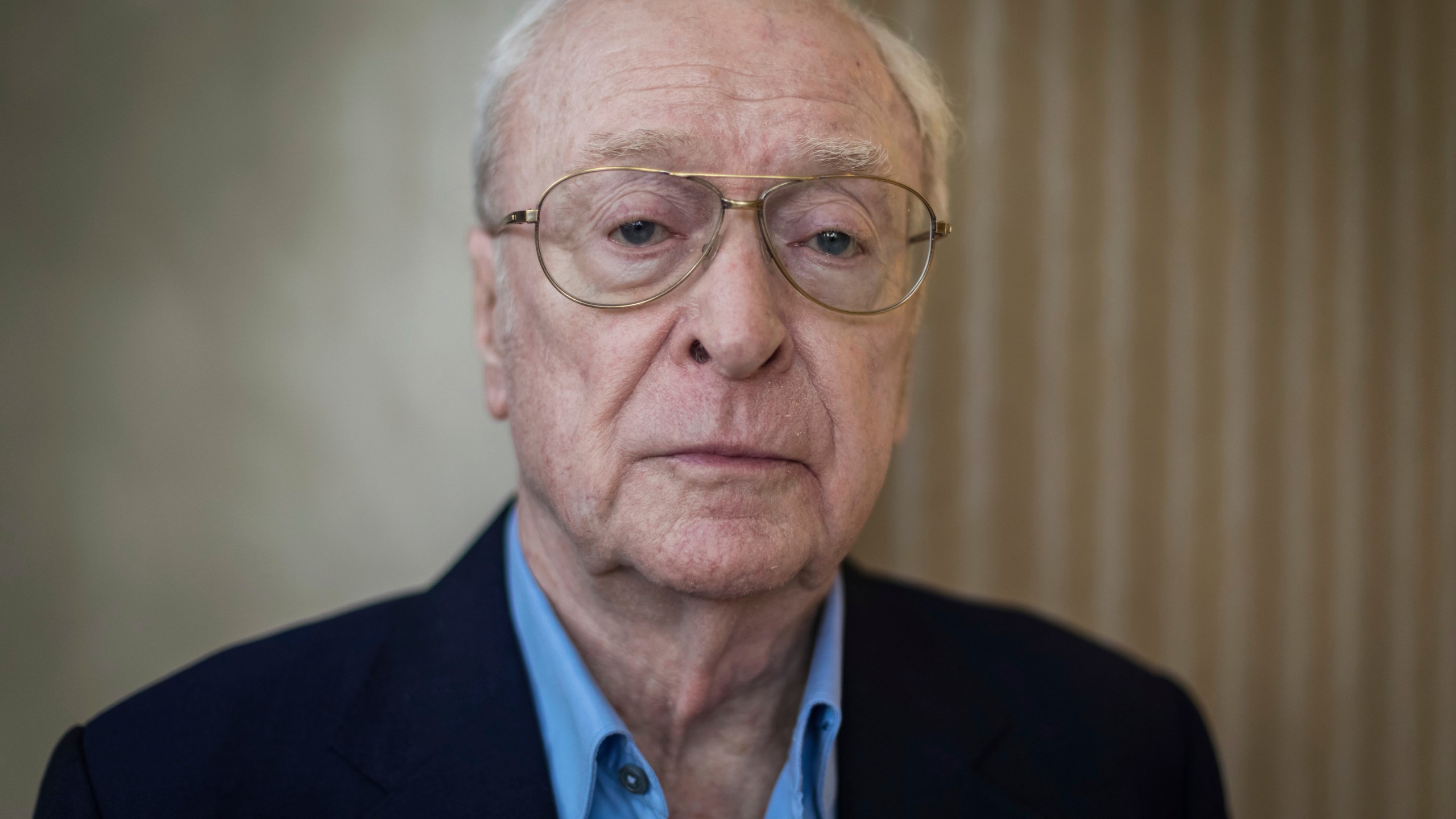 FILE - British actor Michael Caine poses for a photograph in London, Oct. 11, 2018. (Photo by Vianney Le Caer/Invision/AP, File)
