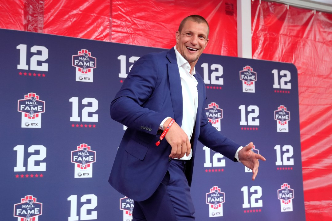 FILE - Former New England Patriots tight end Rob Gronkowski arrives for the Patriots Hall of Fame induction ceremony for former Patriots quarterback Tom Brady, at Gillette Stadium on June 12, 2024, in Foxborough, Mass. (AP Photo/Steven Senne, File)