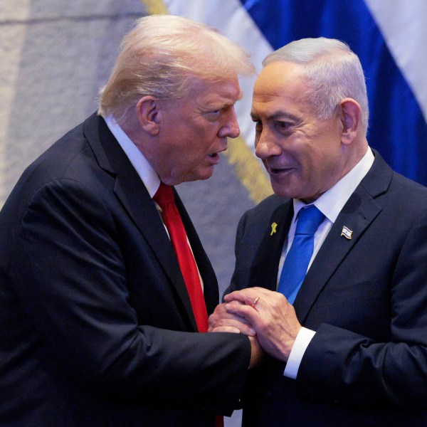 FILE - President Donald Trump talks with Israel's Prime Minister Benjamin Netanyahu at the Knesset, Israel's parliament, Monday, Oct. 13, 2025, in Jerusalem. (Chip Somodevilla/Pool via AP, file)