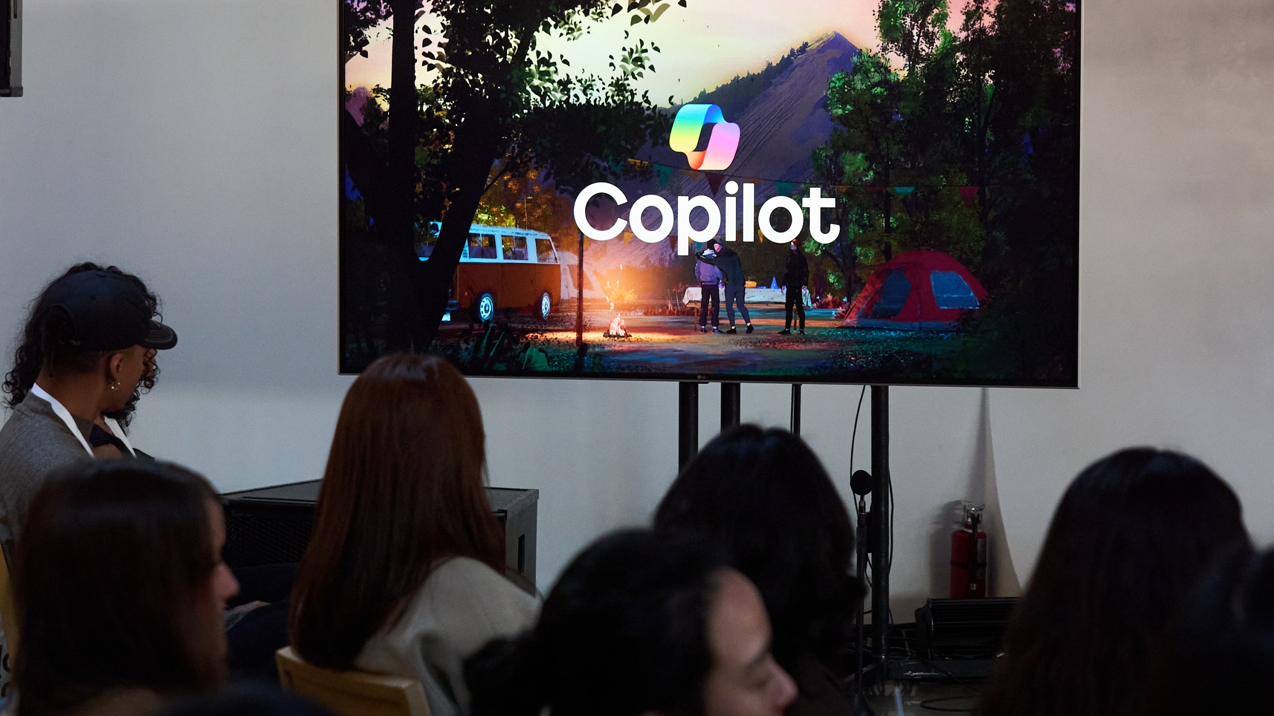 A video animation shows a Copilot Appearance avatar called Mico, floating around an abstract environment during a presentation at Microsoft's Fall 2025 Copilot Sessions event on Wednesday, Oct. 22, 2025, in Los Angeles. (AP Photo/Damian Dovarganes)