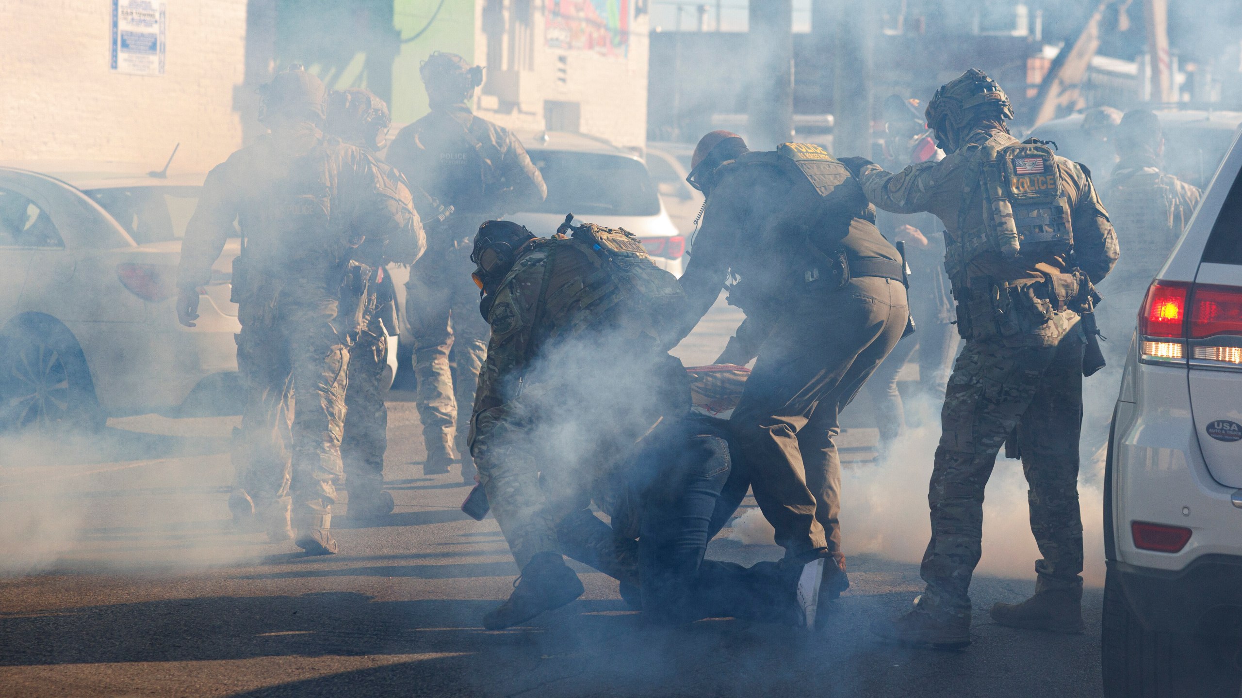 FILE - Federal immigration enforcement agents detain a protester in the Little Village neighborhood of Chicago on Oct. 23, 2025. (Anthony Vazquez/Chicago Sun-Times via AP, File)