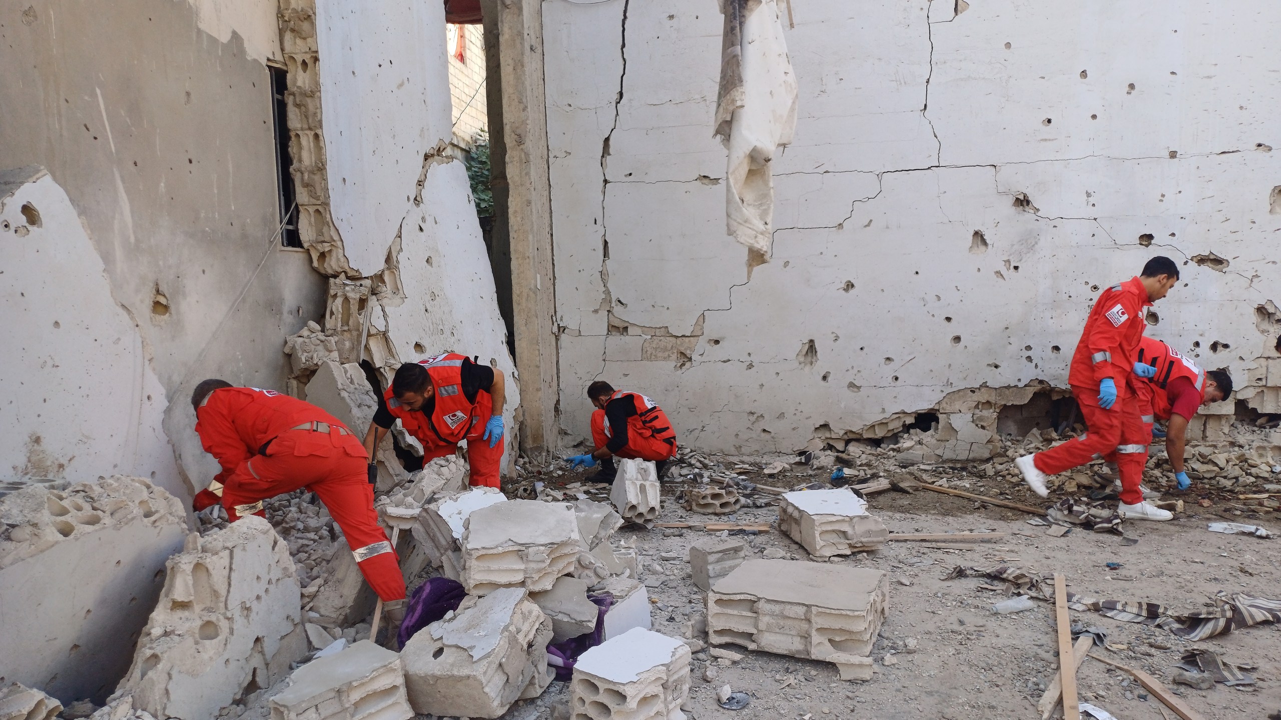 Palestinian rescue workers collect body remains at the scene where an Israeli strike on Tuesday night hit the Ein el-Hilweh Palestinian refugee camp, in the southern port city of Sidon, Lebanon, Wednesday, Nov. 19, 2025. (AP Photo/Mohammed Zaatari)