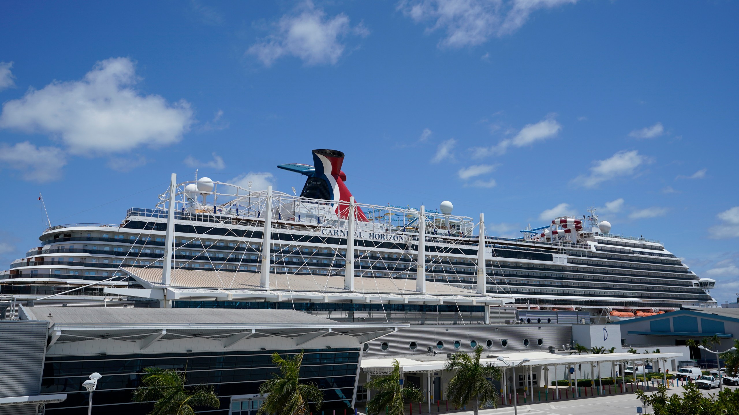 FILE - Carnival Cruise Line's Carnival Horizon cruise ship is shown docked at PortMiami, Friday, April 9, 2021, in Miami. (AP Photo/Wilfredo Lee,File)
