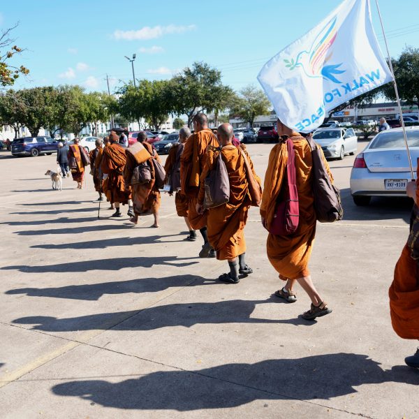 The Buddhist monks from the Huong Dao Vipassana Bhavana Center in Fort Worth, who are undertaking a 2,300 mile pilgrimage of "Walk for Peace," arrive for a welcome ceremony at Hong Kong City Mall in Houston, Friday, Nov. 14, 2025. (Melissa Phillip/Houston Chronicle via AP)